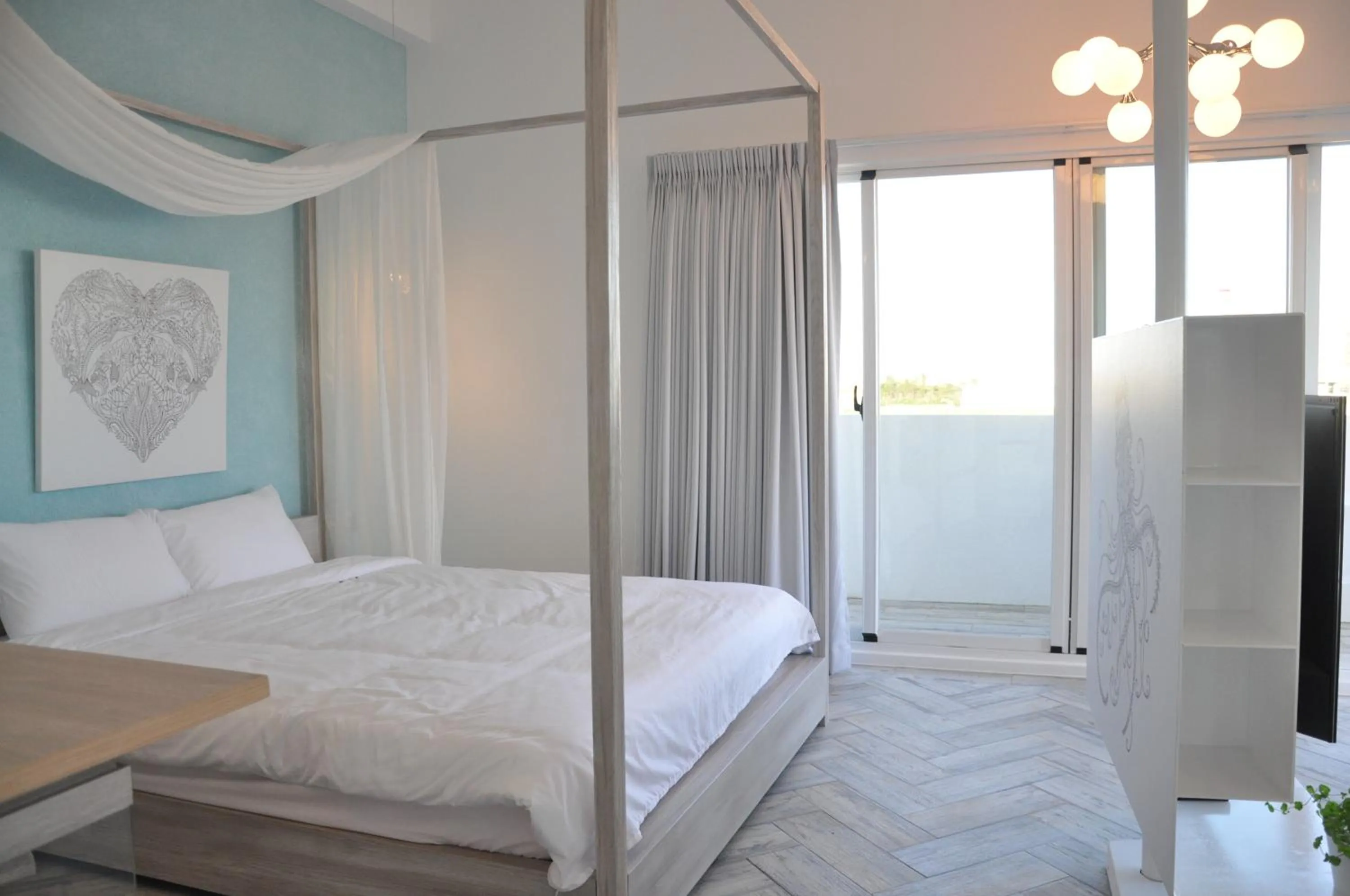 Bed in Color Coral Boutique Hotel