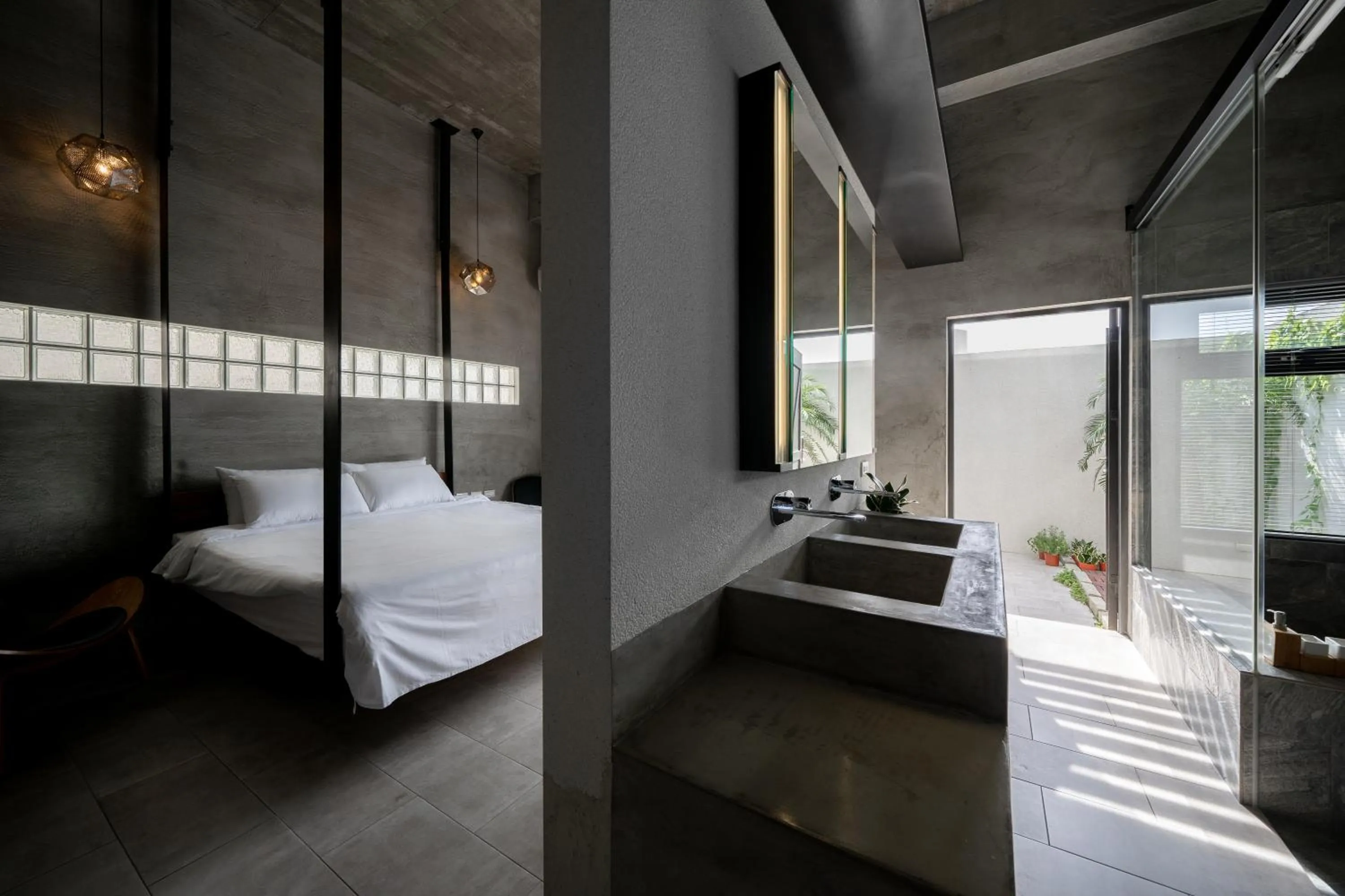 Photo of the whole room, Bed in Color Coral Boutique Hotel