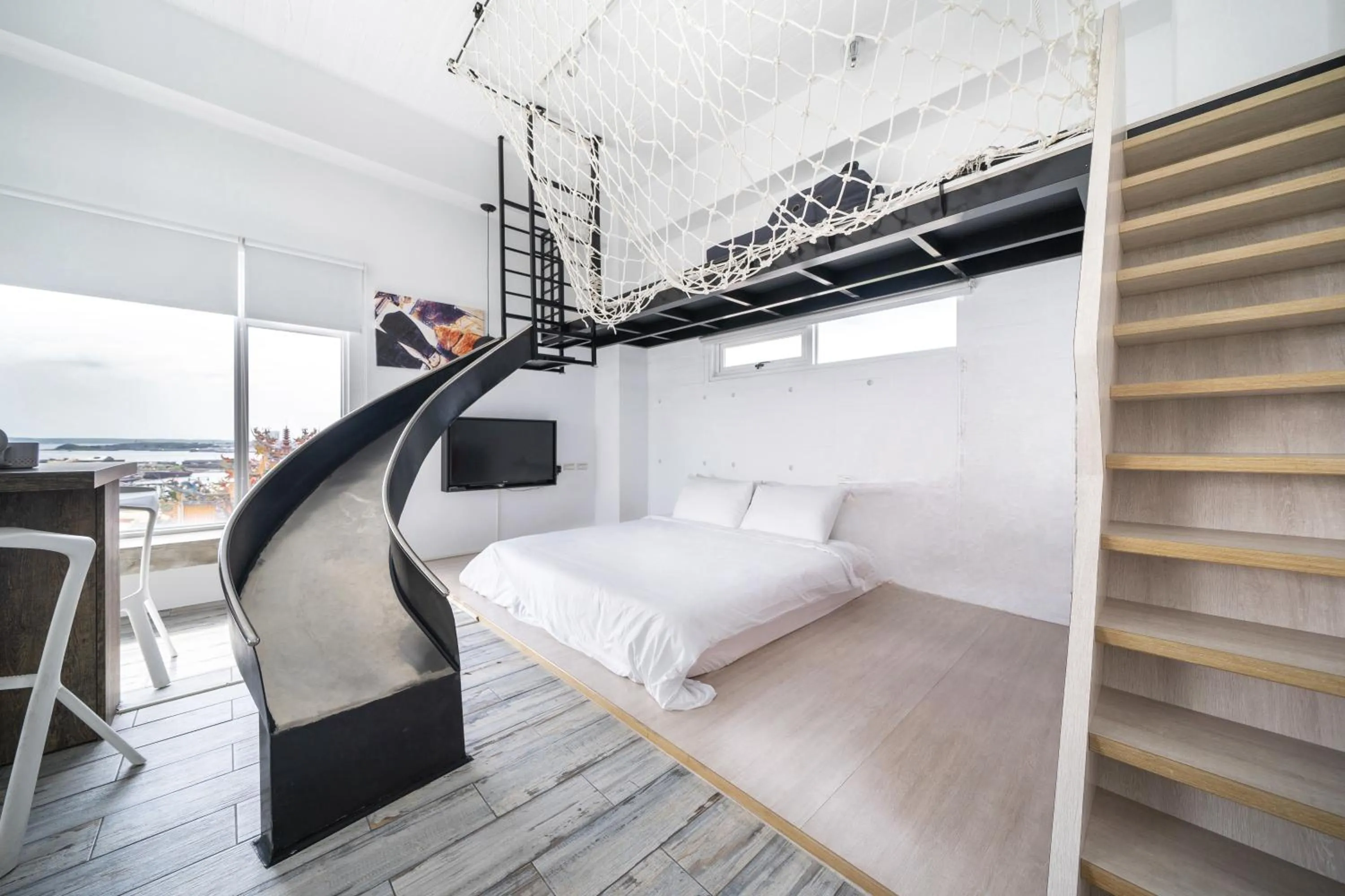 Photo of the whole room, Bed in Color Coral Boutique Hotel