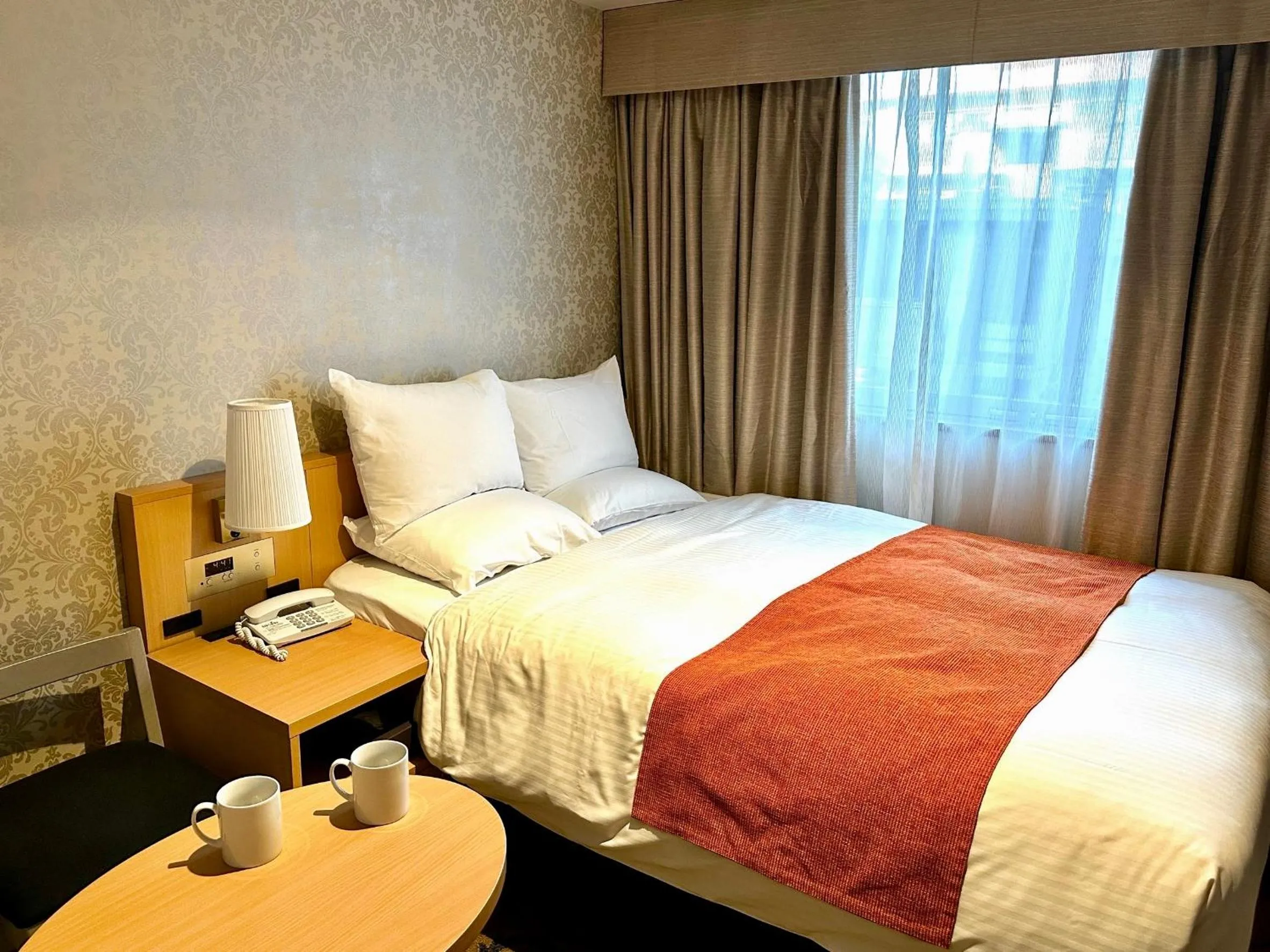 Bed in Hotel Rose Garden Shinjuku