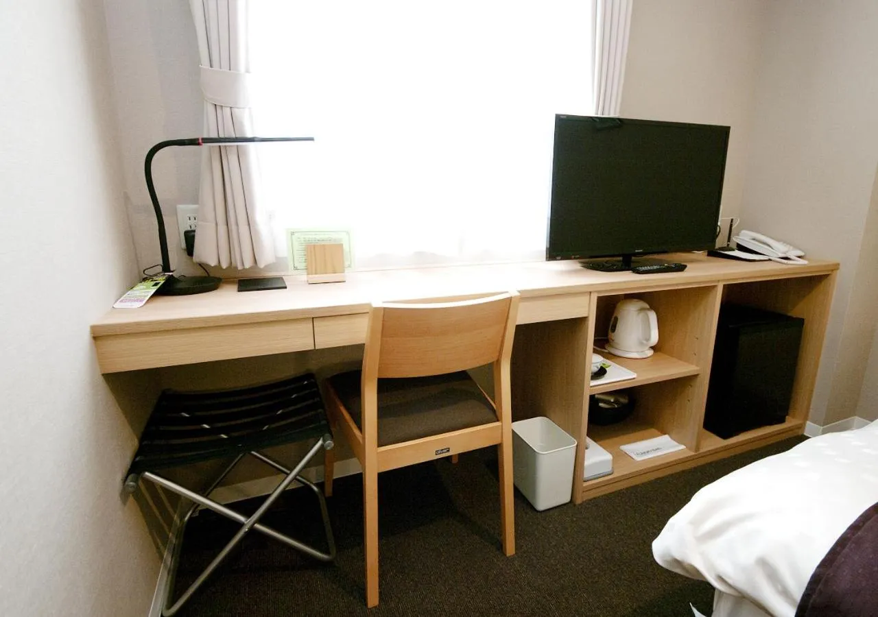 Bed in Shibetsu Grand Hotel