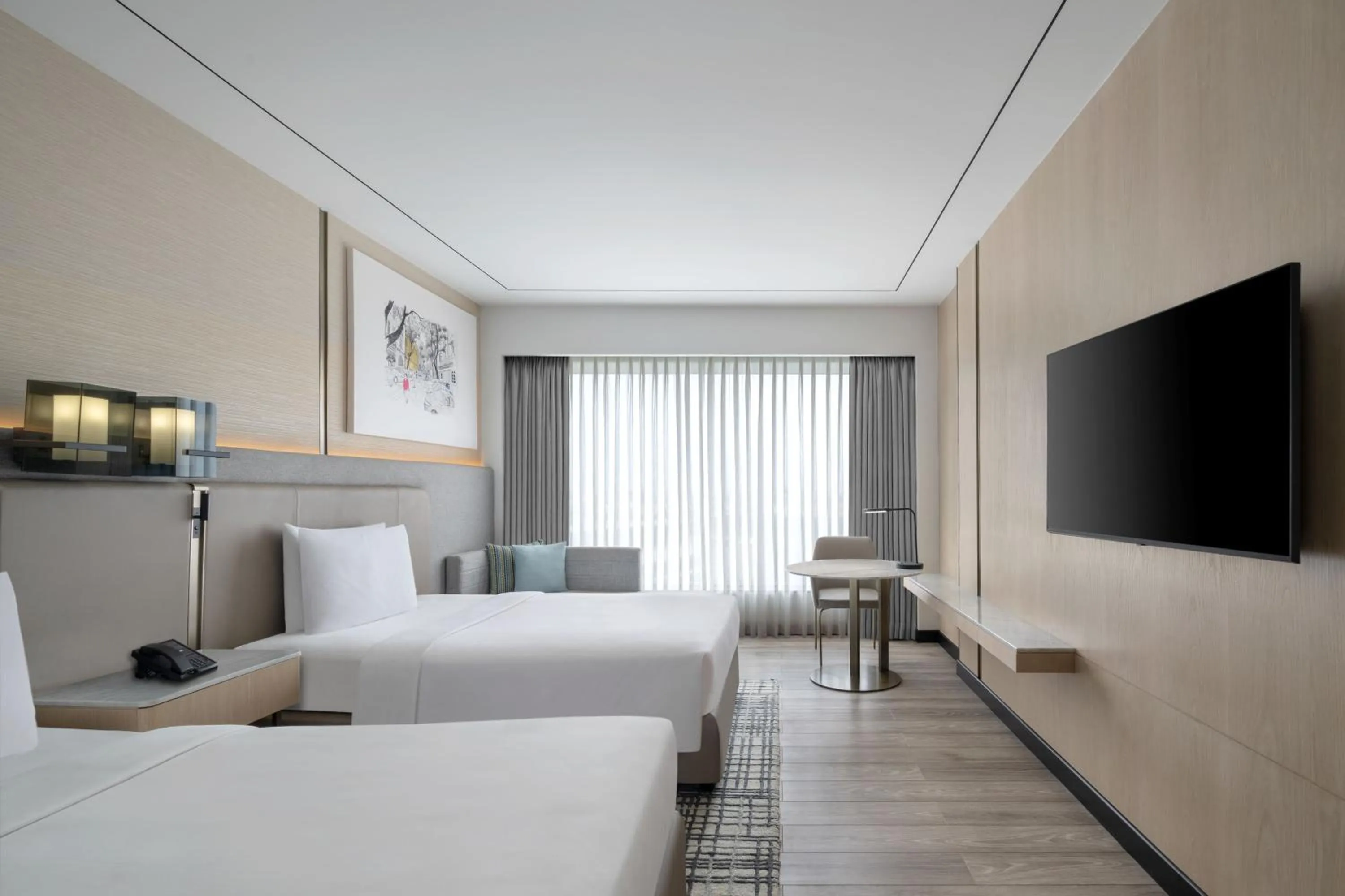 Bed in Courtyard by Marriott Mumbai International Airport