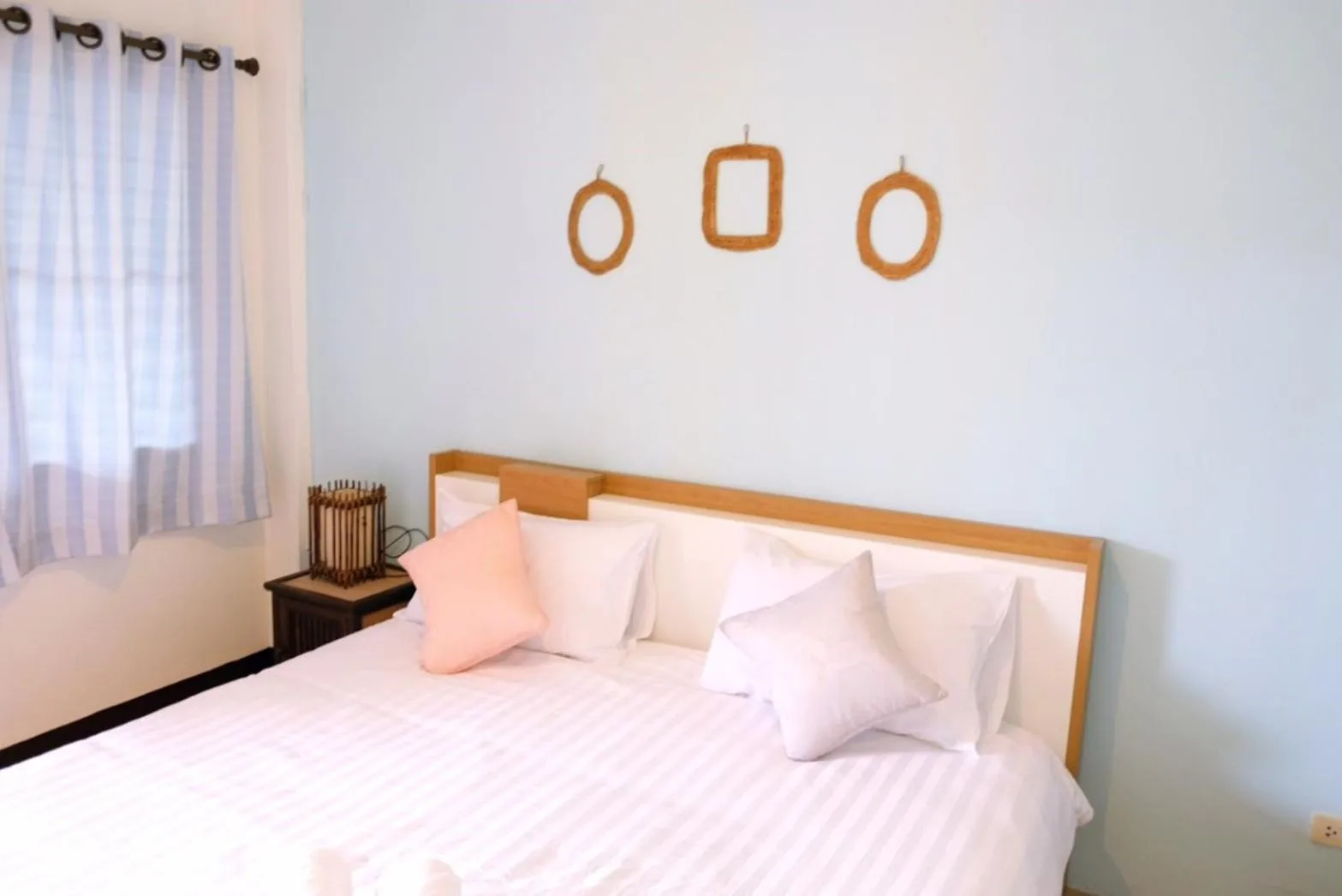 Bed in Yen Aura Boutique Hotel