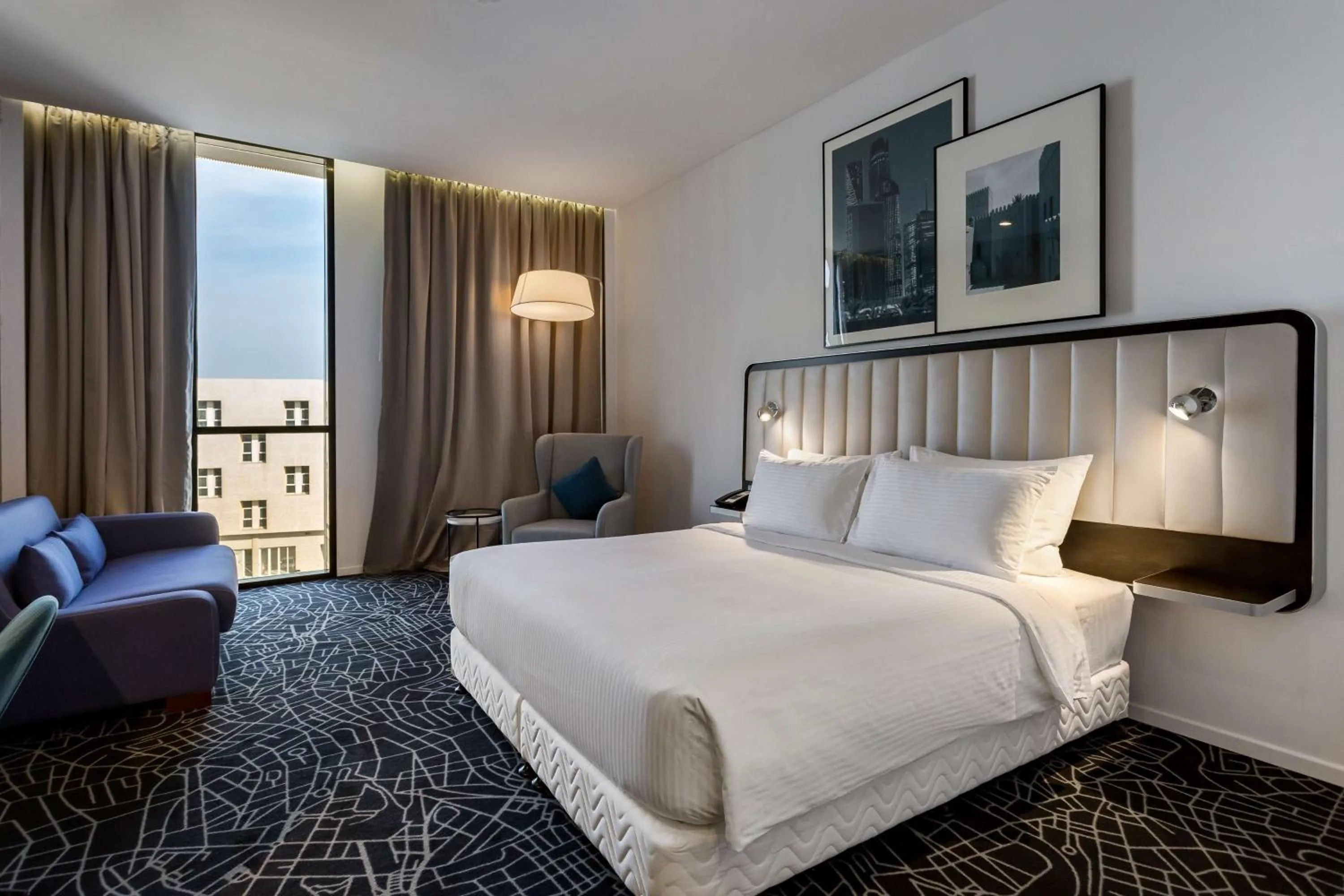 Photo of the whole room, Bed in Radisson Hotel & Apartments Dammam Industrial City