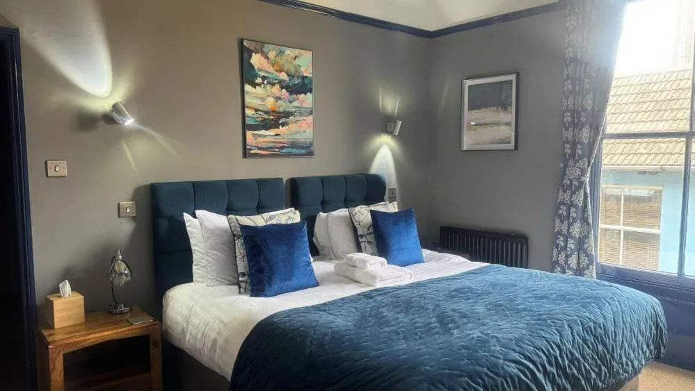 Bed in The Red Lion Hotel