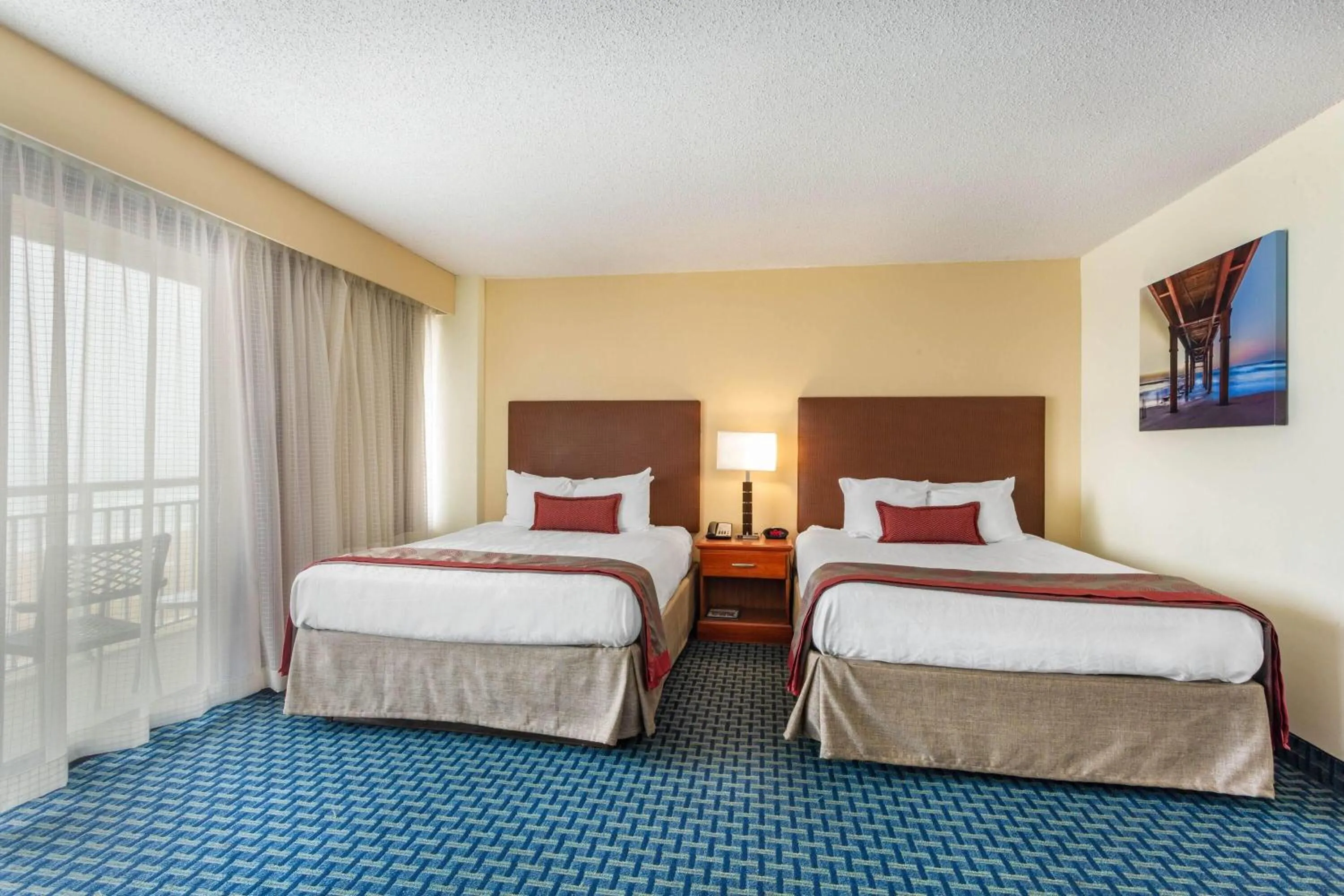 Photo of the whole room, Bed in Ramada Plaza by Wyndham Virginia Beach Oceanfront