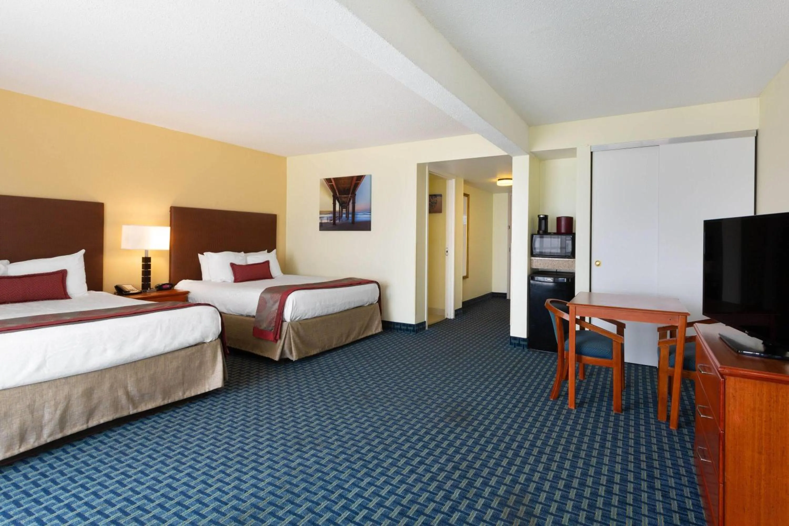Photo of the whole room, Bed in Ramada Plaza by Wyndham Virginia Beach Oceanfront