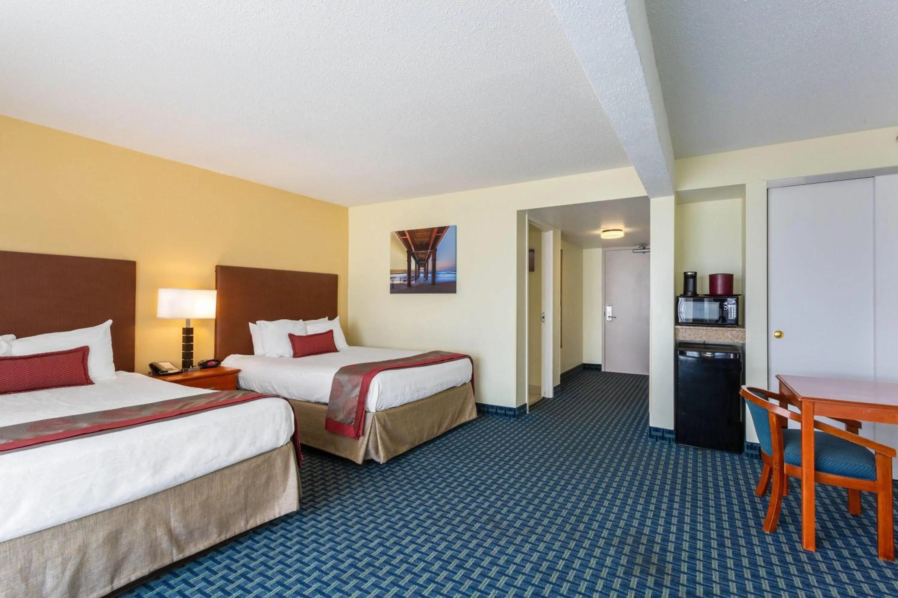 Photo of the whole room, Bed in Ramada Plaza by Wyndham Virginia Beach Oceanfront