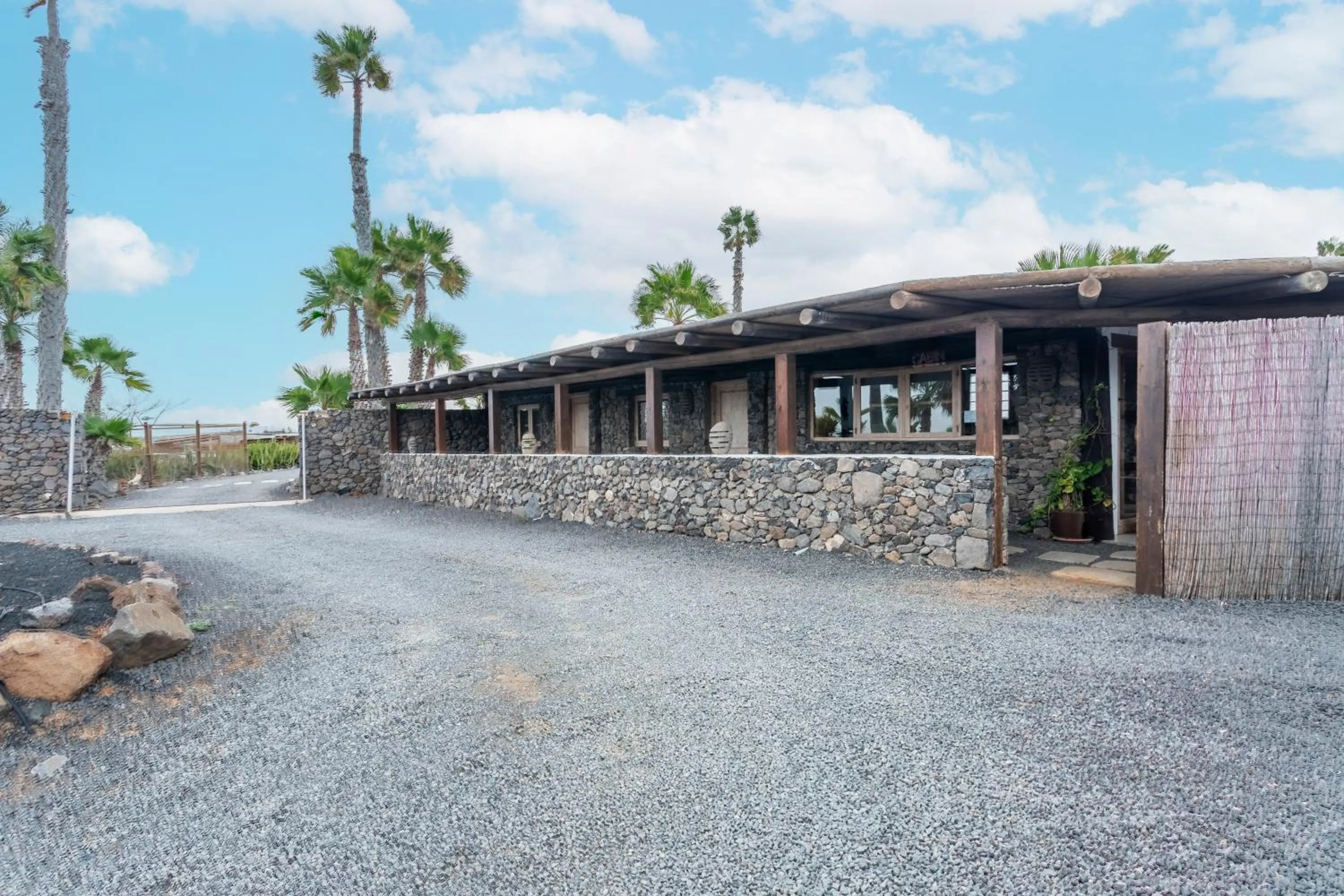 Property building in Finca De Arrieta Village - Yurts and Stone Cottages - Shared Pool - Walking distance to Arrieta Beach - Off Grid