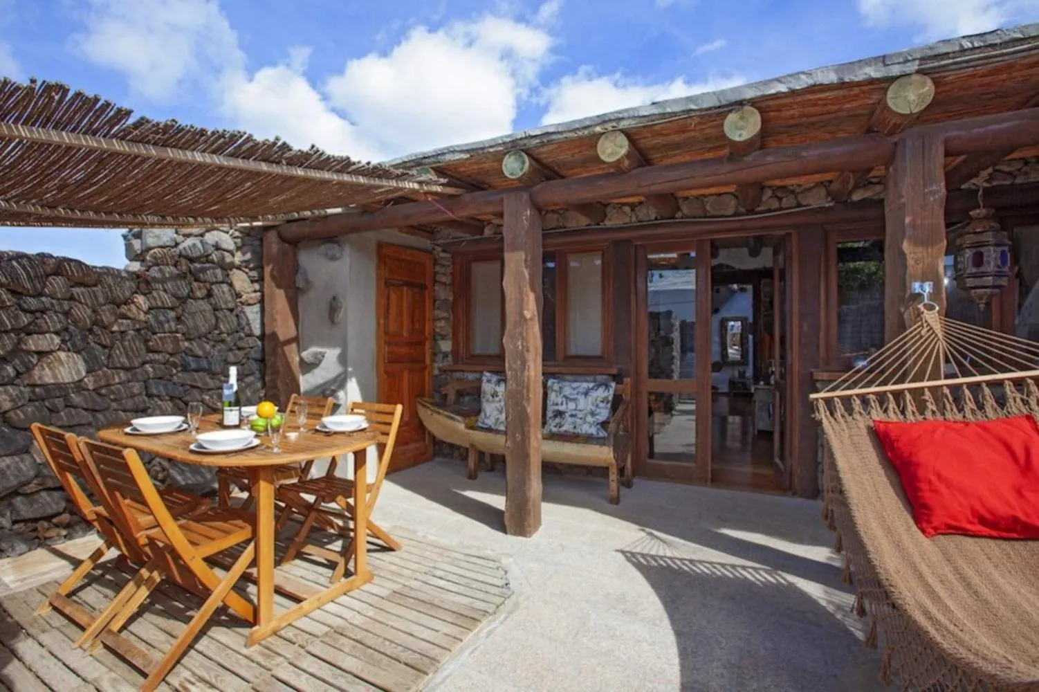 Patio in Finca De Arrieta Village - Yurts and Stone Cottages - Shared Pool - Walking distance to Arrieta Beach - Off Grid