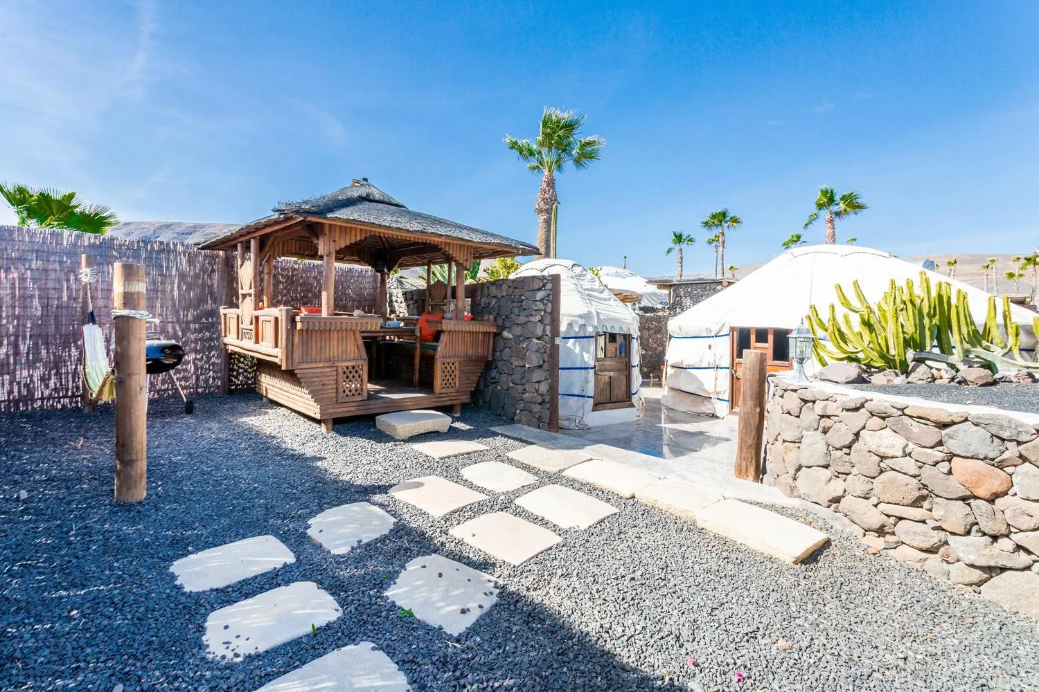 Patio in Finca De Arrieta Village - Yurts and Stone Cottages - Shared Pool - Walking distance to Arrieta Beach - Off Grid