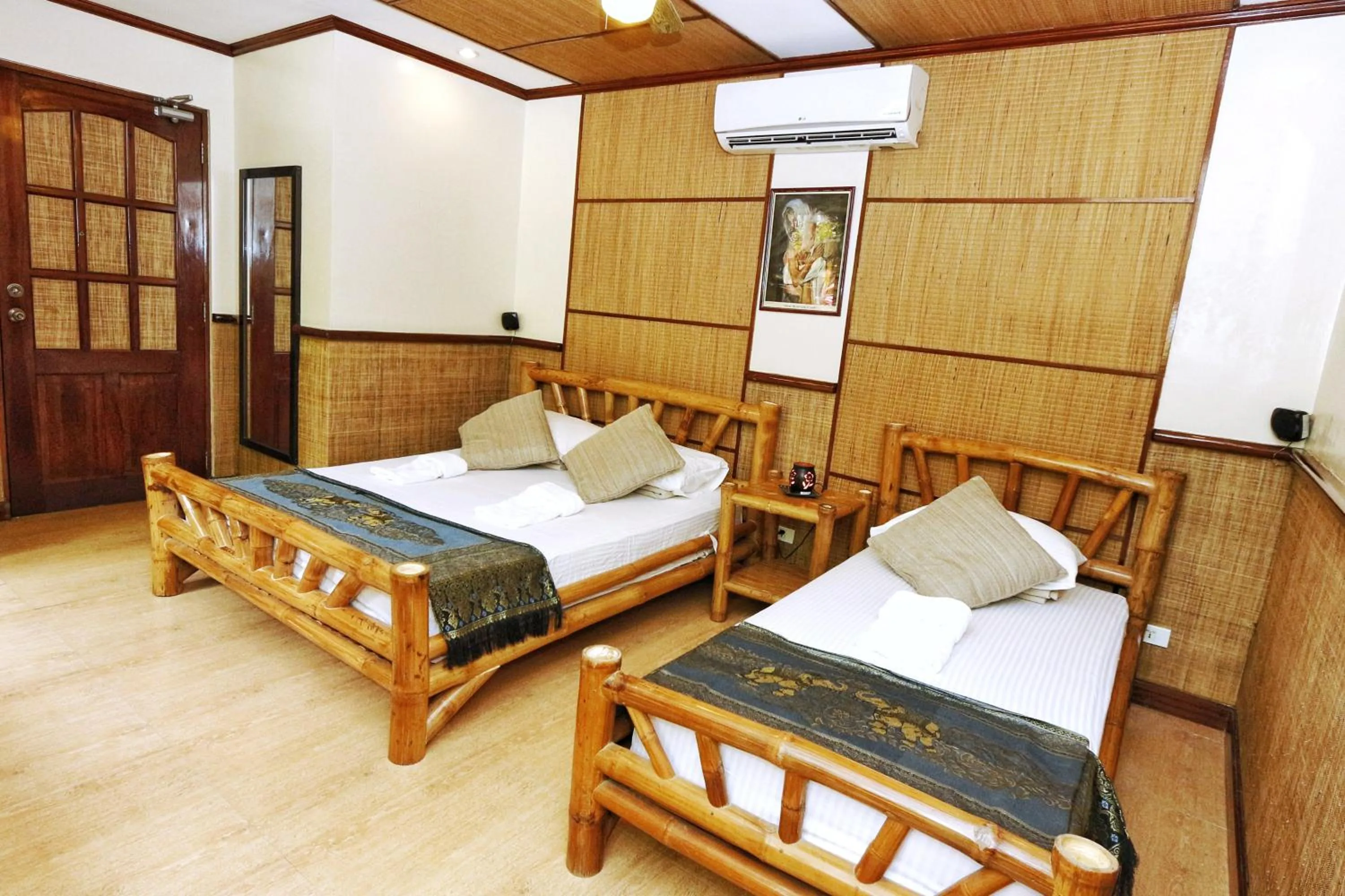 Bed in Noni's Resort