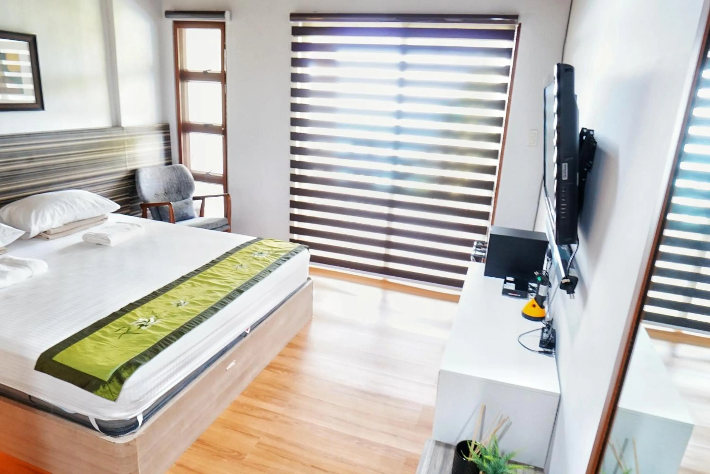 Bed in Noni's Resort