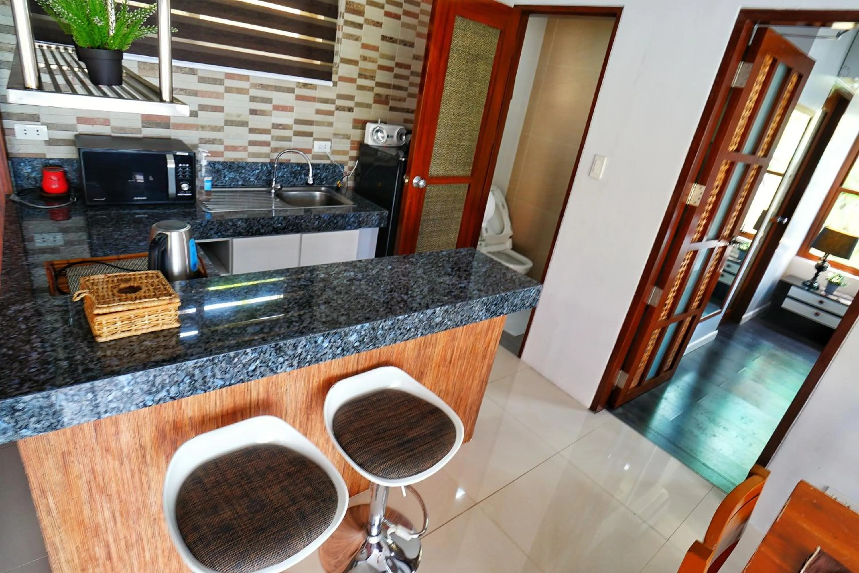 Kitchen or kitchenette in Noni's Resort