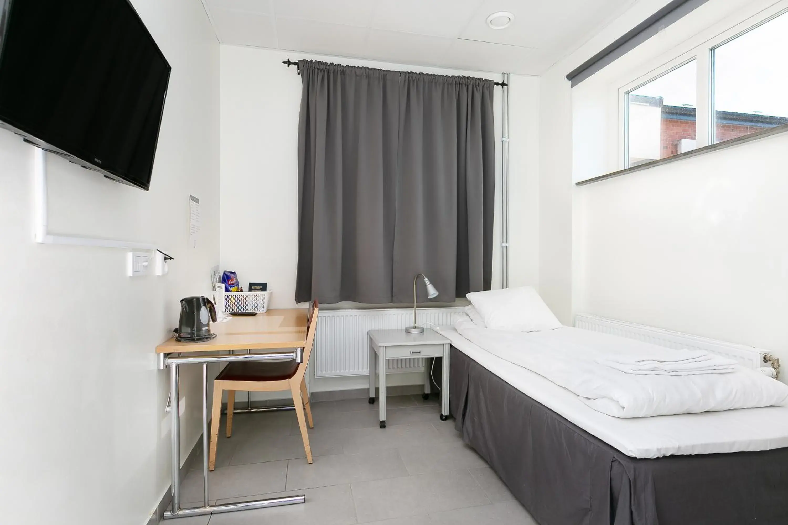Budget Single Room with Shared Bathroom - single occupancy in Kalmar Hotell Budget Single Room with Shared Bathroom - single occupancy in Kalmar Hotell
