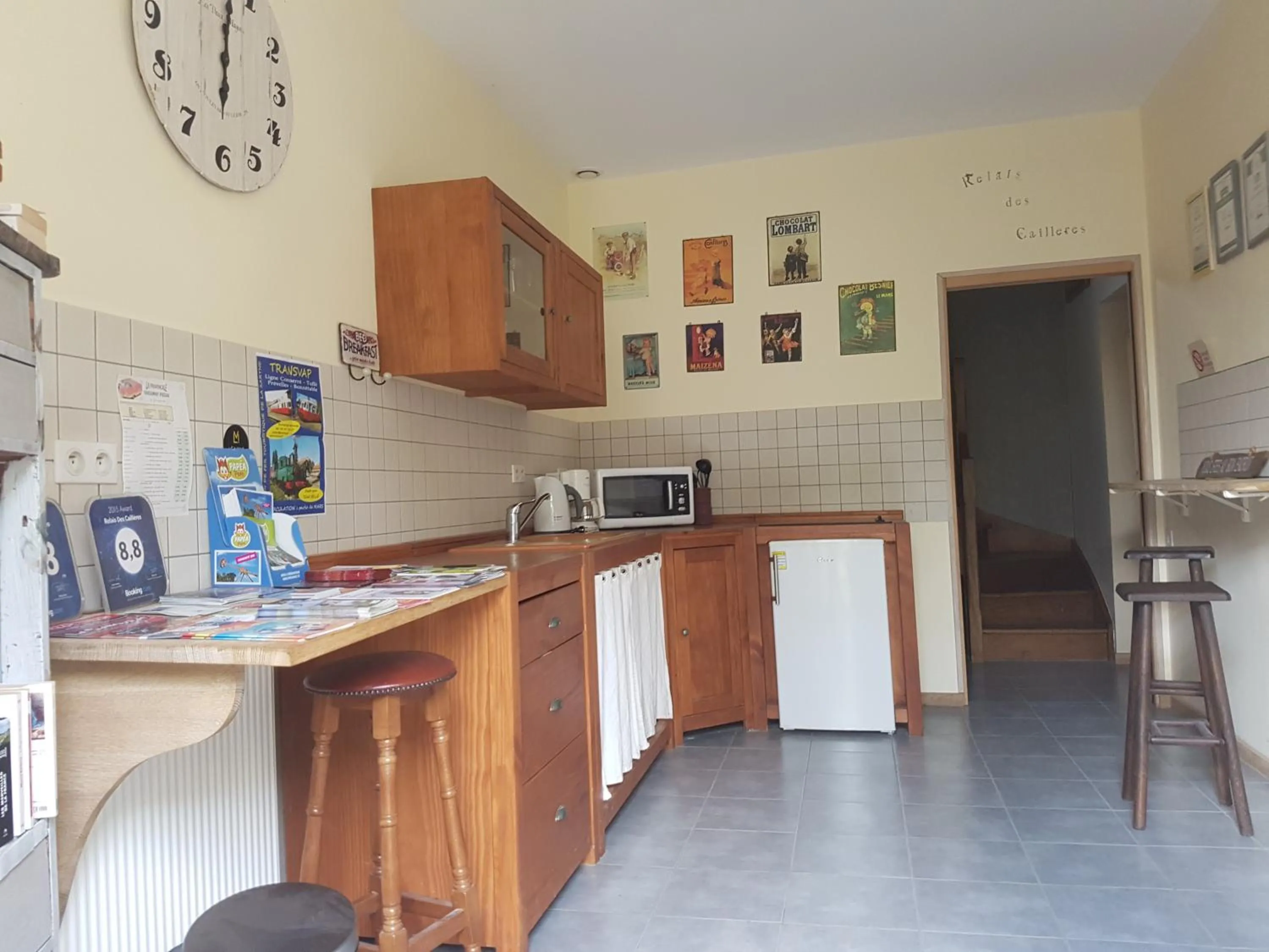 Kitchen or kitchenette in Logis Hôtel Relais Des Caillères