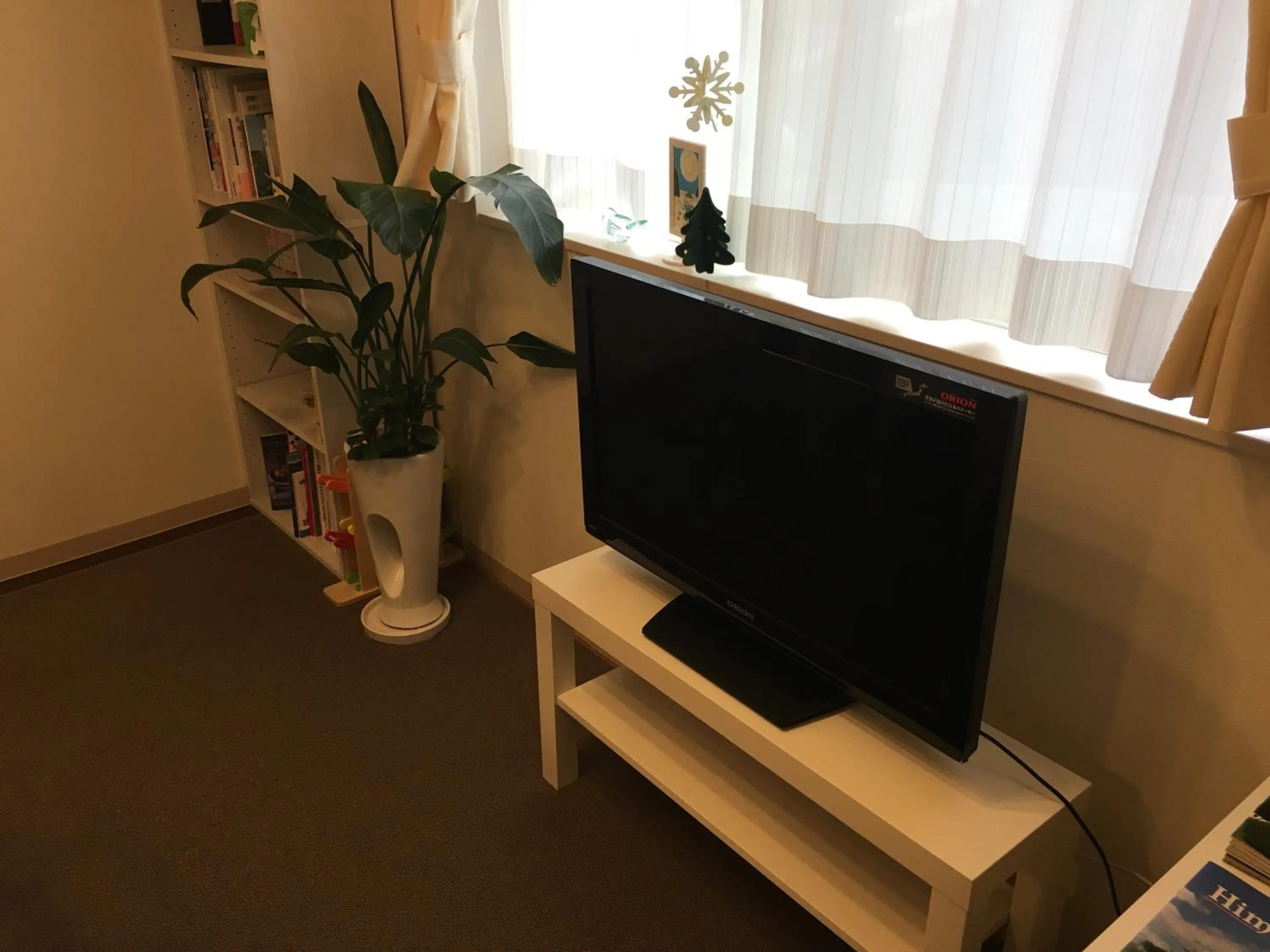 Communal lounge/ TV room in Shironoshita Guesthouse