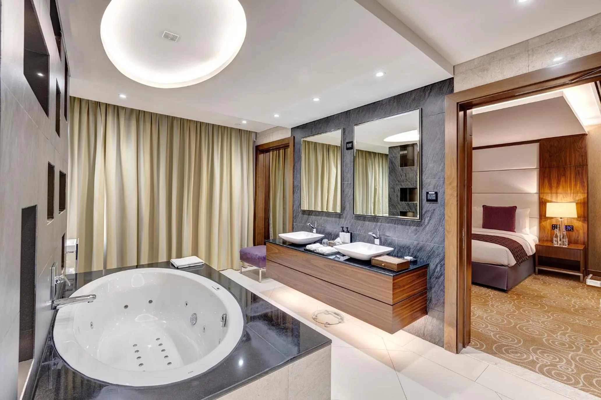 Bathroom, Bed in Crowne Plaza Muscat OCEC by IHG