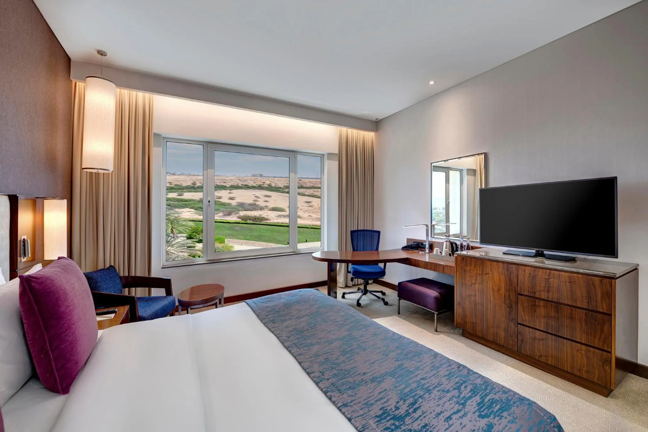 Bed in Crowne Plaza Muscat OCEC by IHG