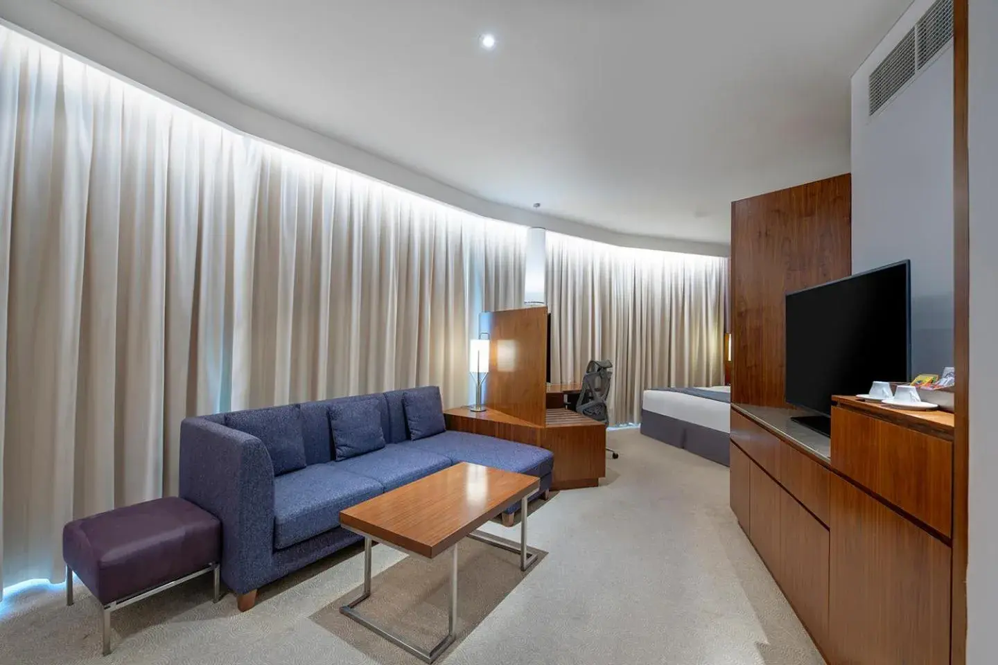 Junior King Suite with Garden View and Lounge Access in Crowne Plaza Muscat OCEC by IHG Junior King Suite with Garden View and Lounge Access in Crowne Plaza Muscat OCEC by IHG