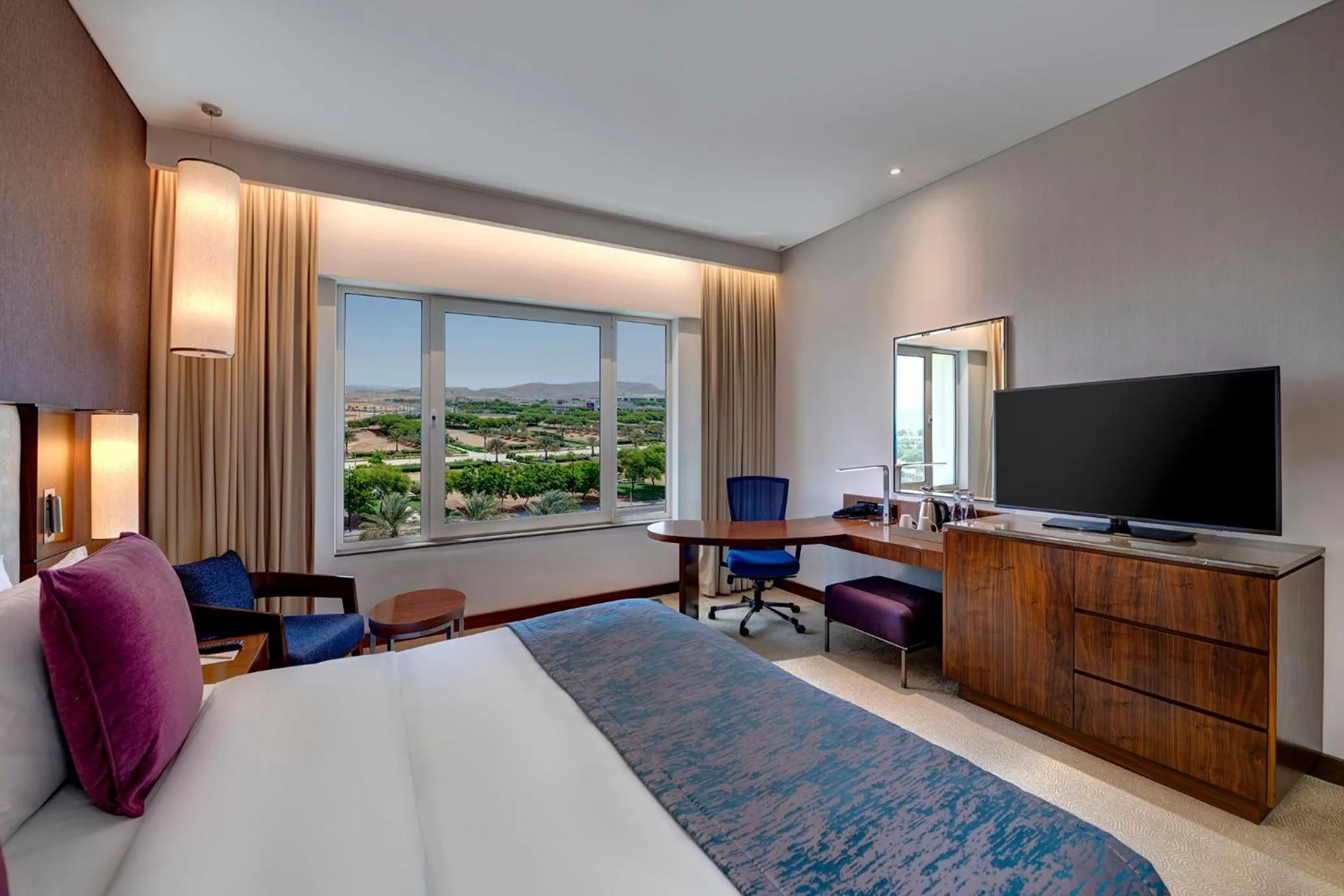 Photo of the whole room, Bed in Crowne Plaza Muscat OCEC by IHG