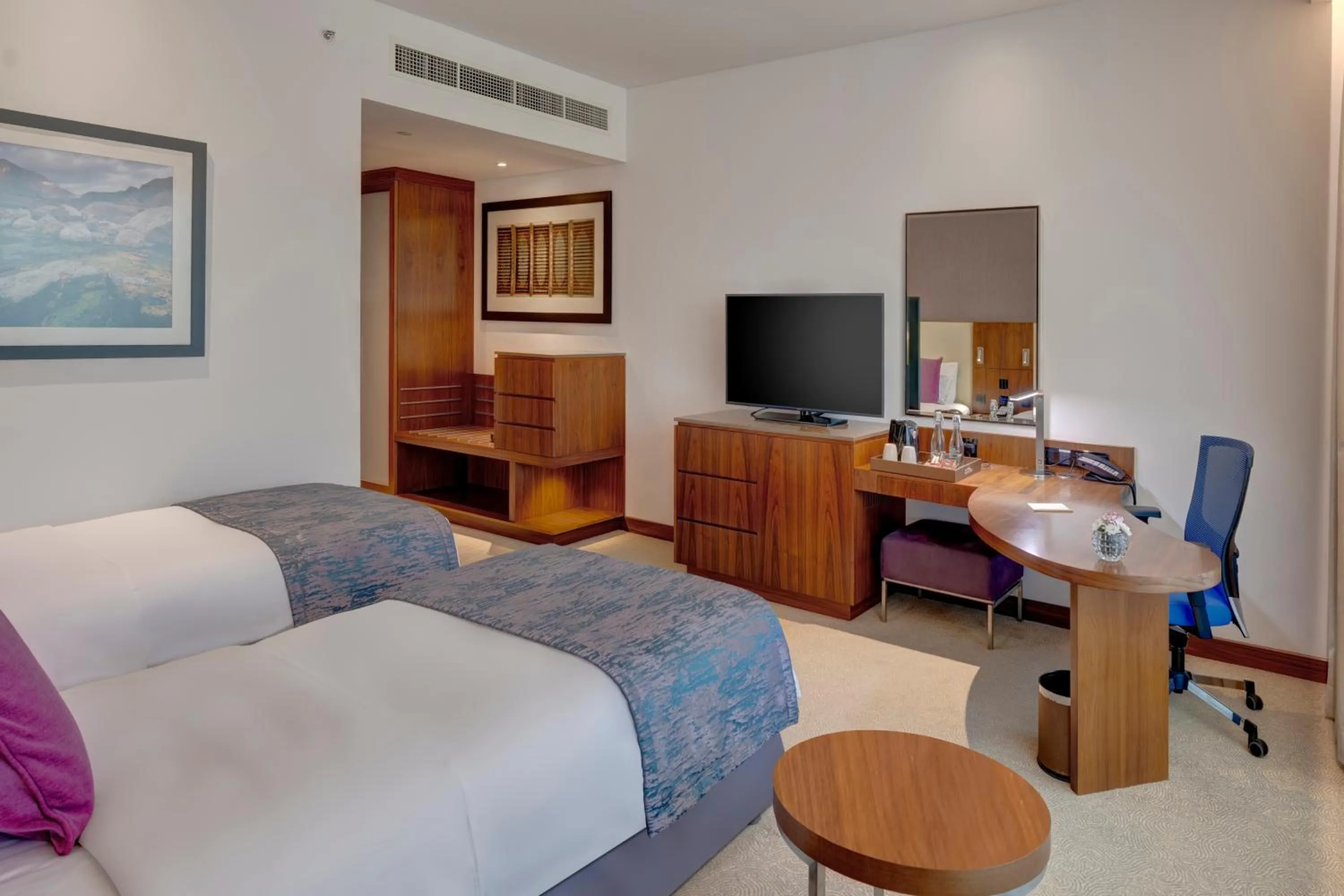 Bed in Crowne Plaza Muscat OCEC by IHG