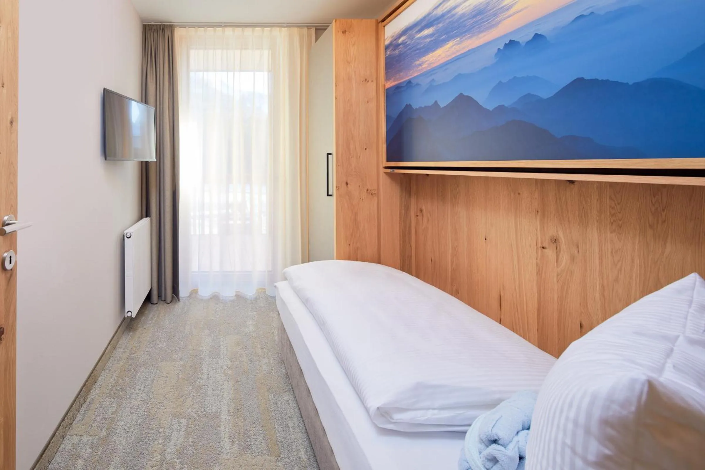 Bedroom, Bed in Zugspitz Resort