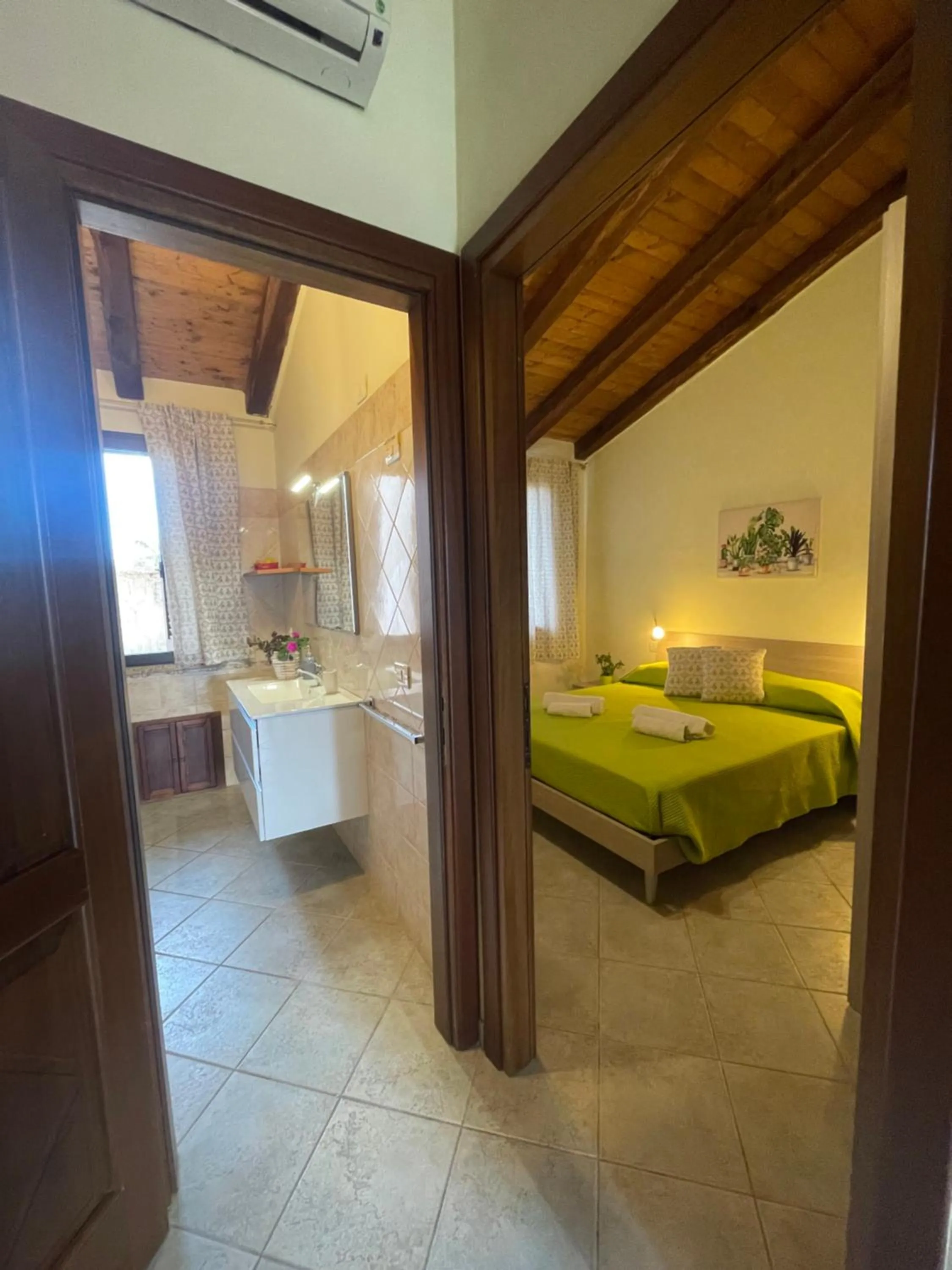 Photo of the whole room, Bed in La Fontana Dei Desideri