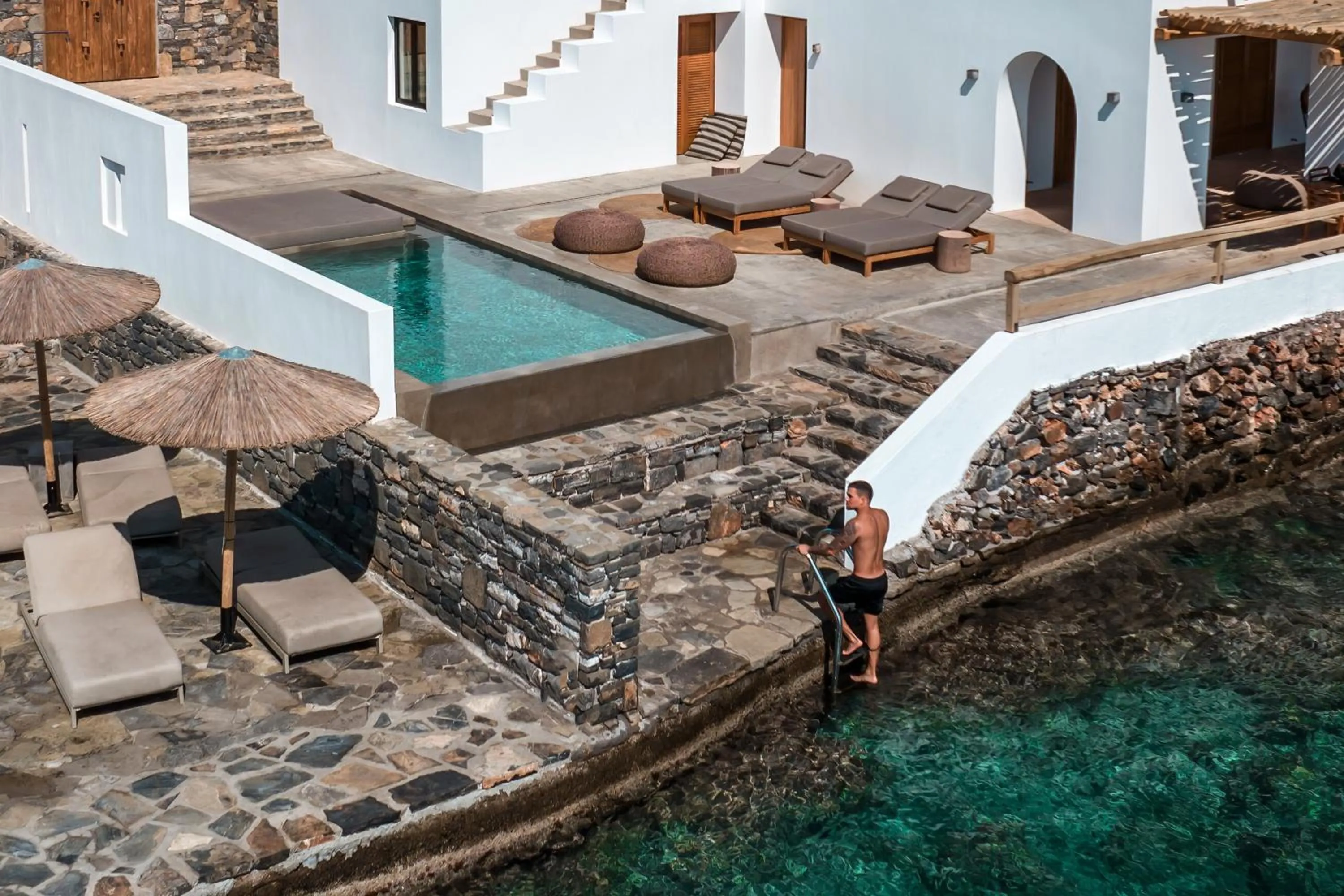 Swimming pool in Minos Beach Art Hotel, a Member of Design Hotels