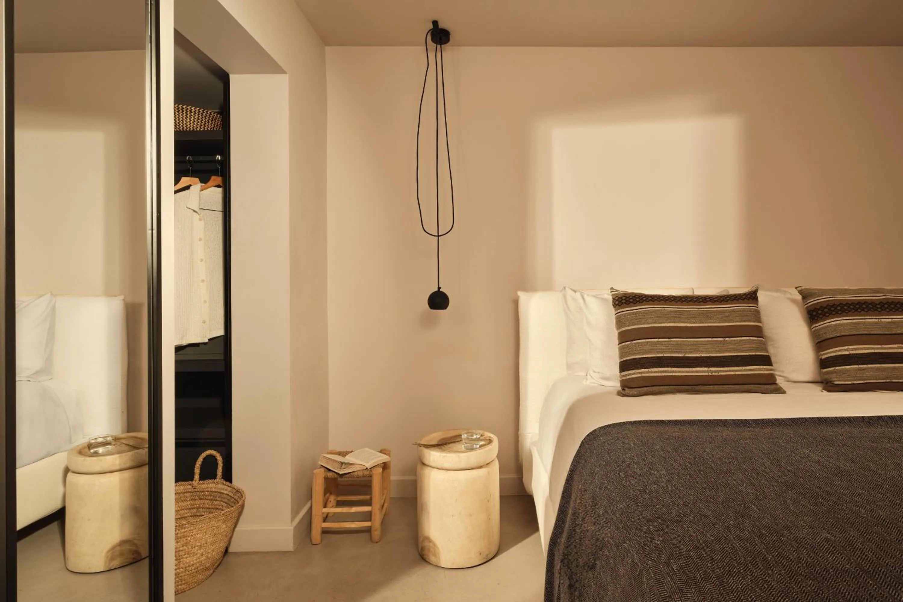 Bed in Minos Beach Art Hotel, a Member of Design Hotels
