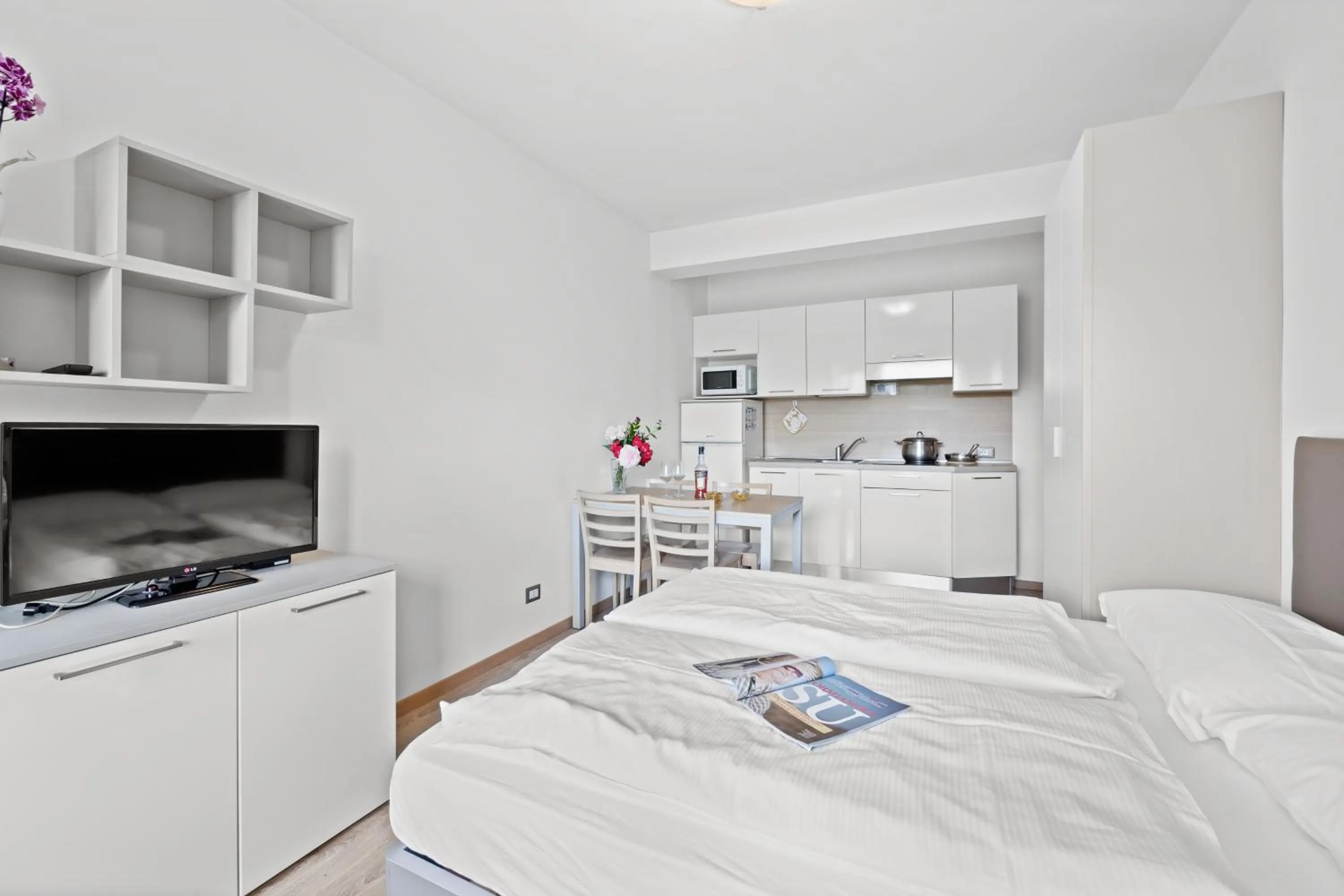 Kitchen or kitchenette, Bed in Residence Lagorai