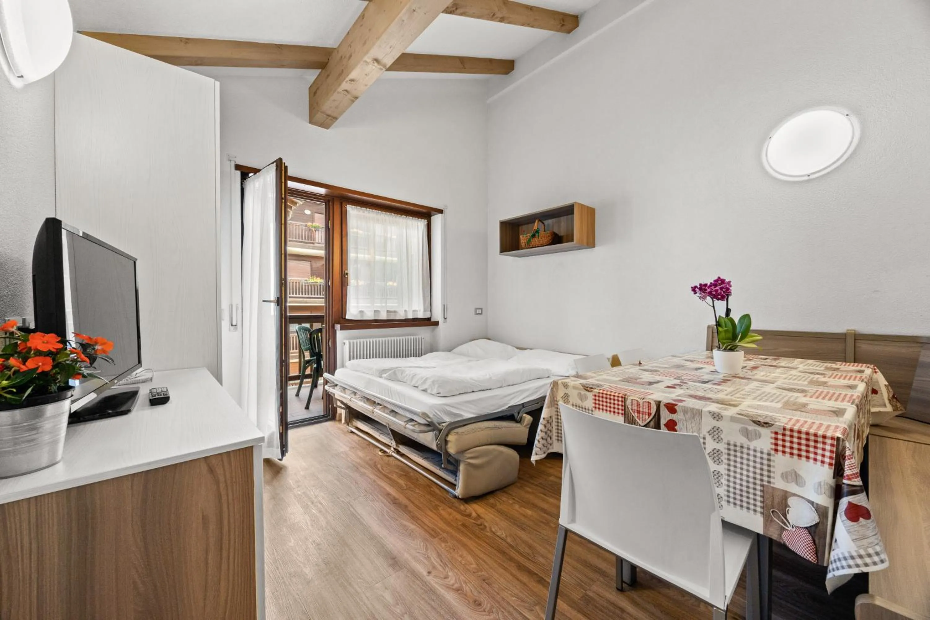 Bed in Aparthotel Des Alpes