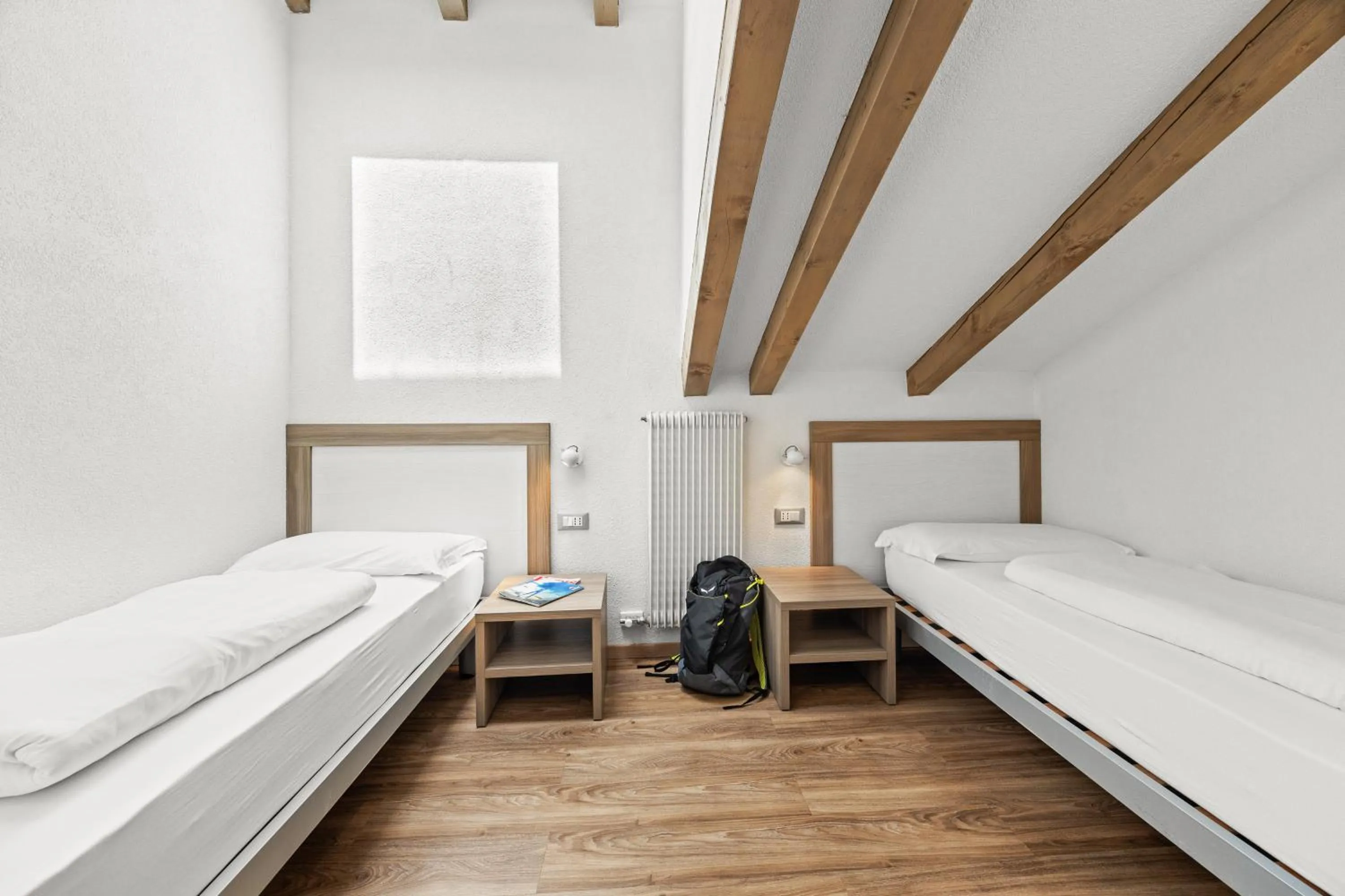 Bed in Aparthotel Des Alpes