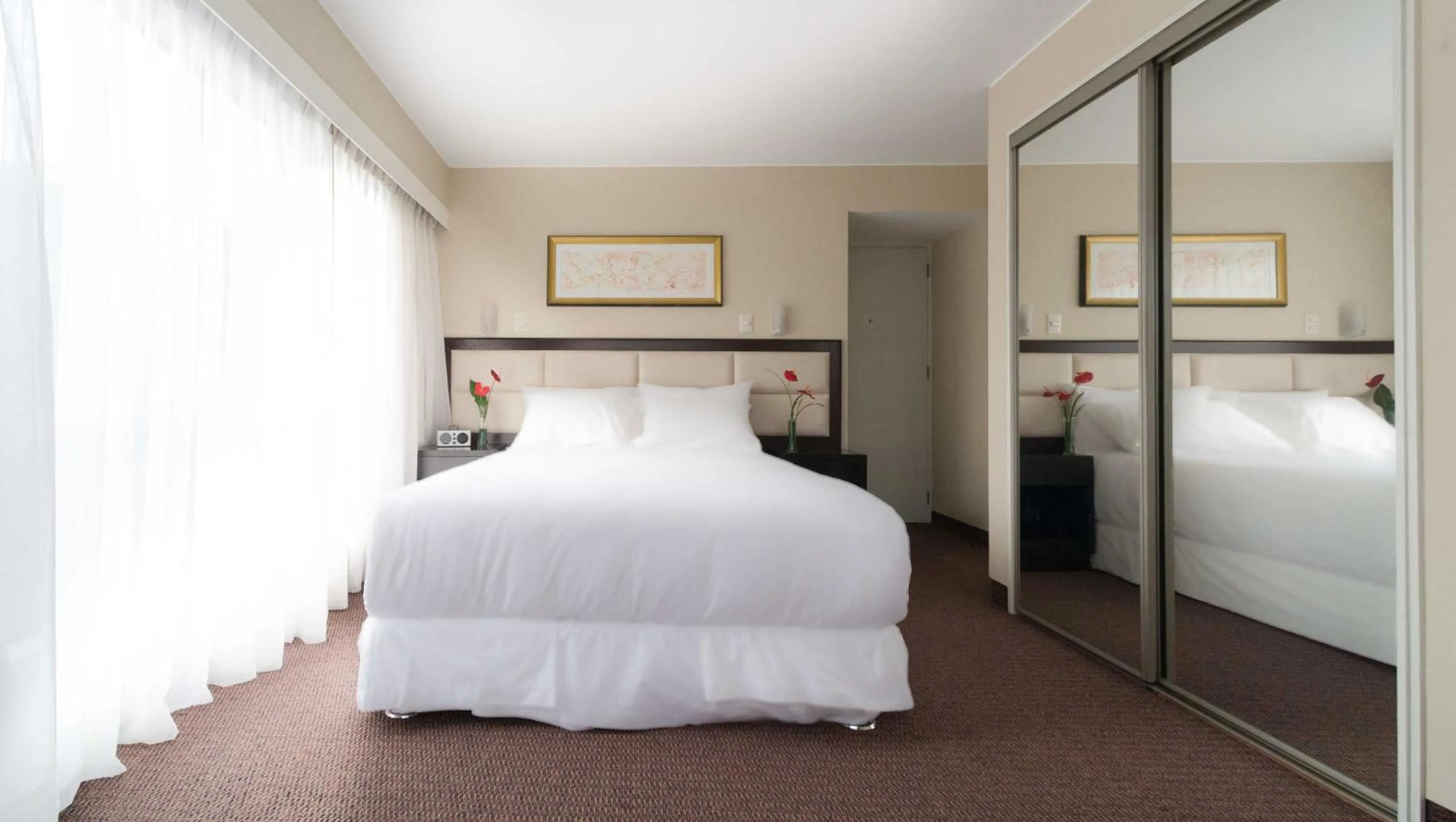 Bed in Roosevelt Hotel & Suites