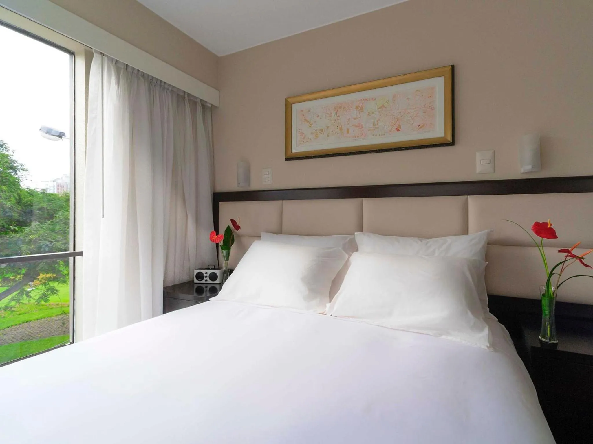 Bed in Roosevelt Hotel & Suites