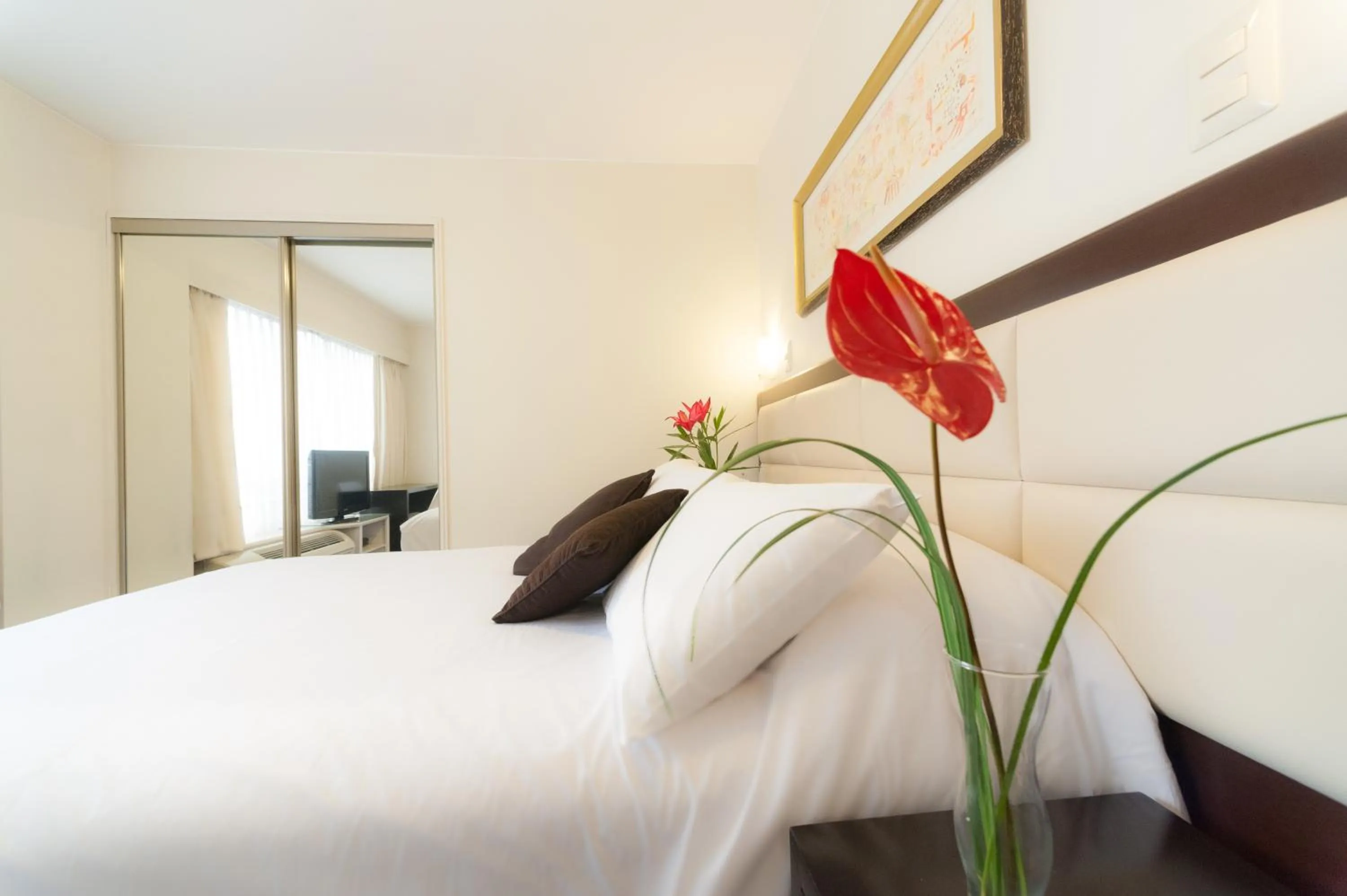 Bed in Roosevelt Hotel & Suites