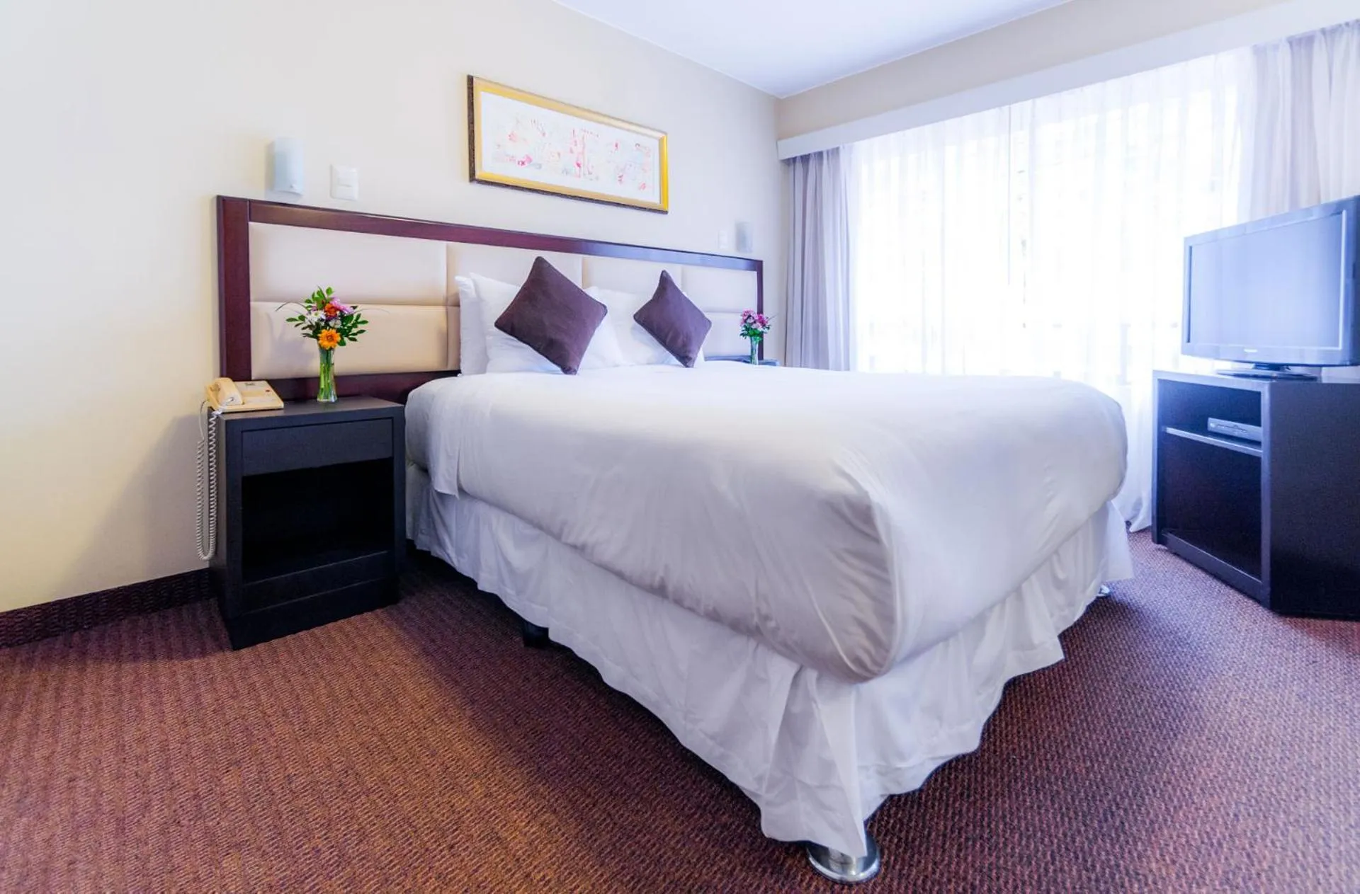 Bed in Roosevelt Hotel & Suites