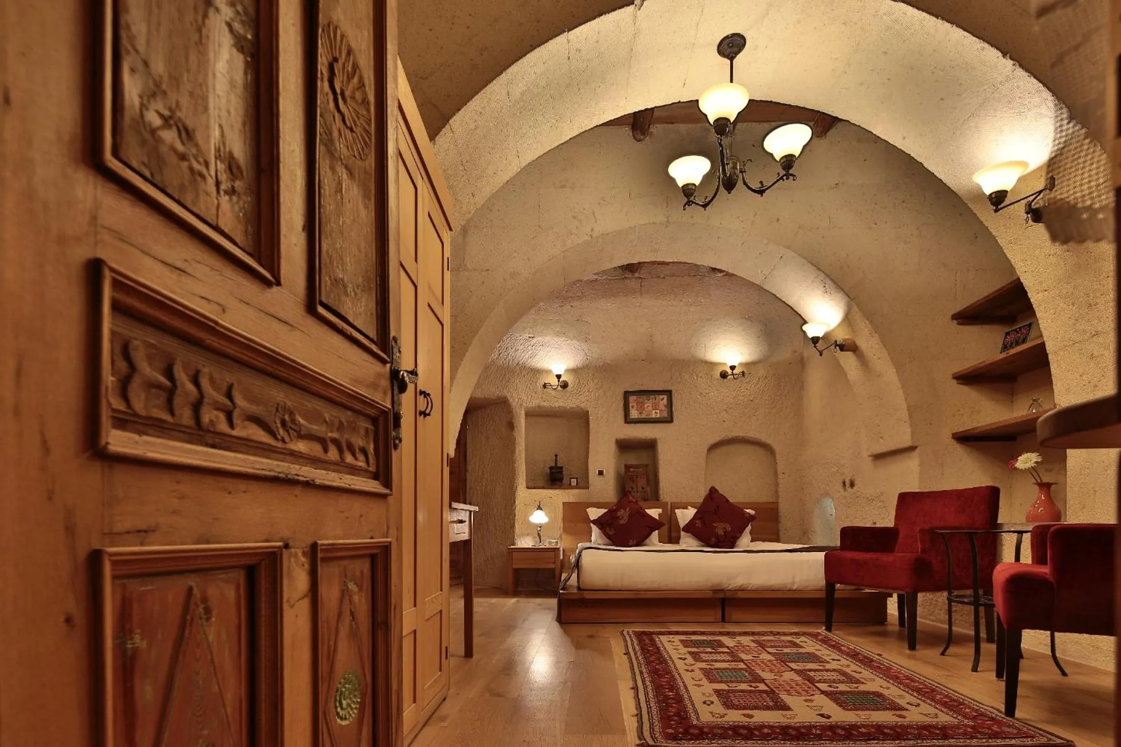 Bed in La Casa Cave Hotel