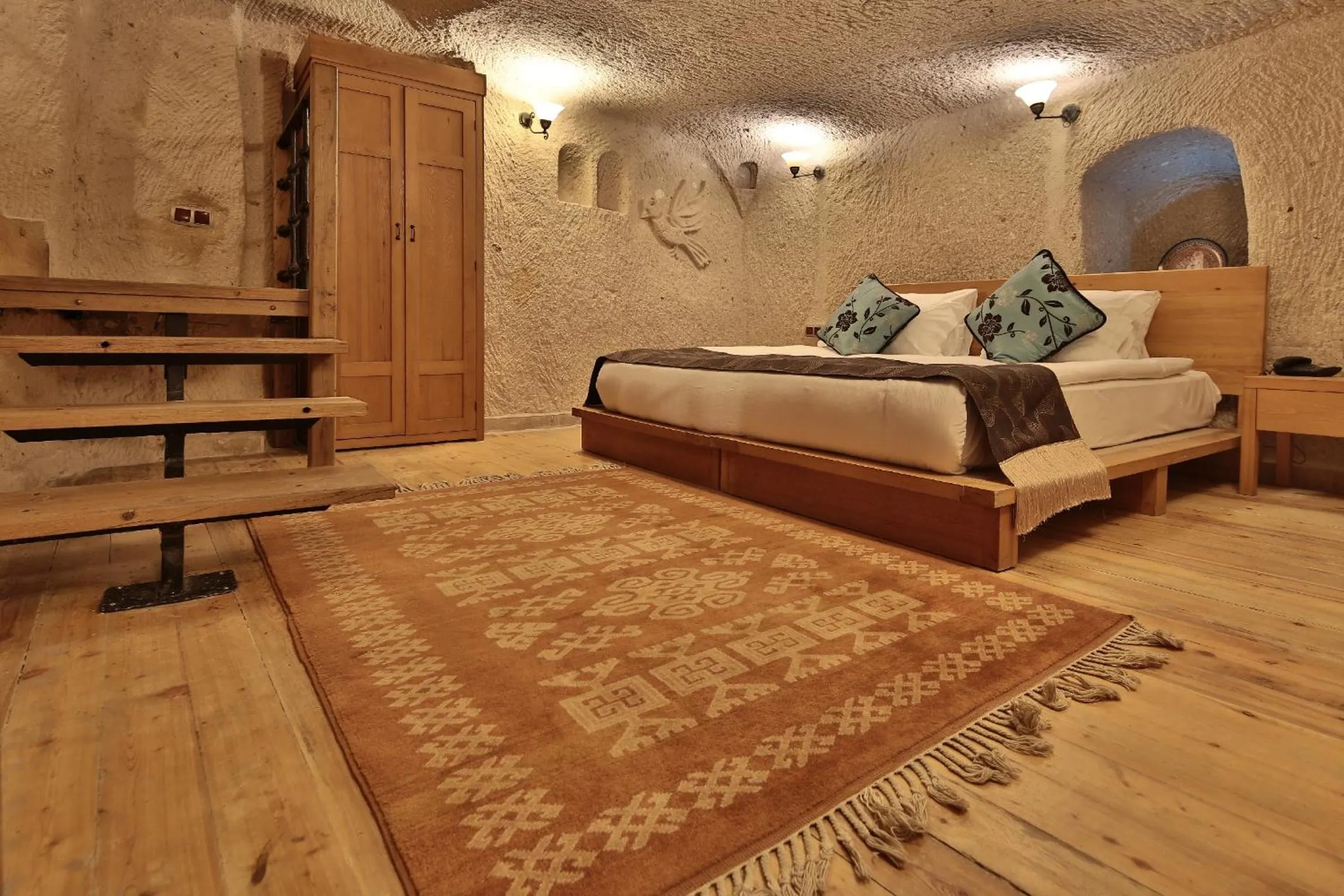 Bed in La Casa Cave Hotel