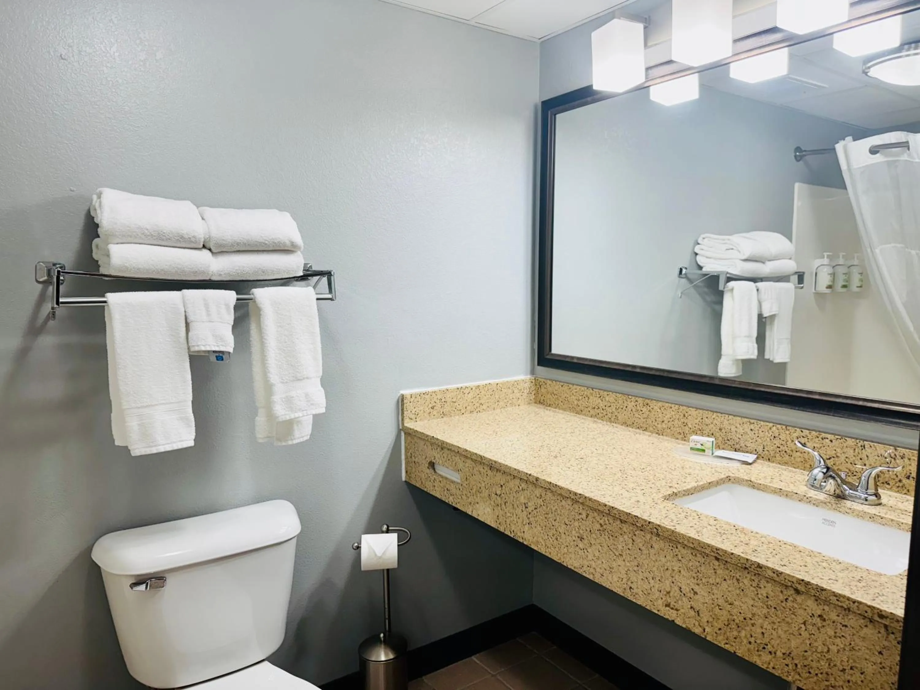 Toilet in AmericInn by Wyndham Stillwater