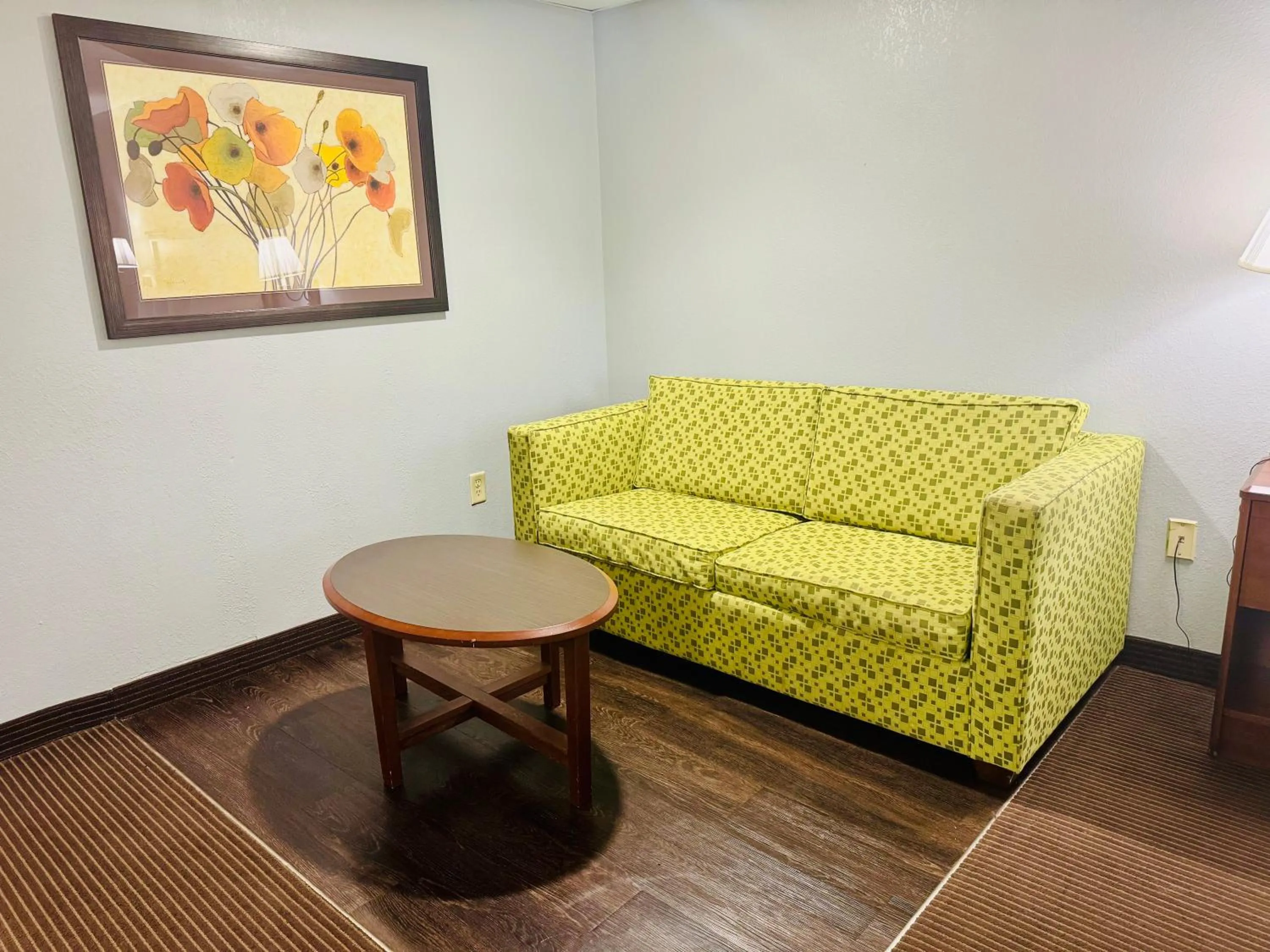 Living room in AmericInn by Wyndham Stillwater