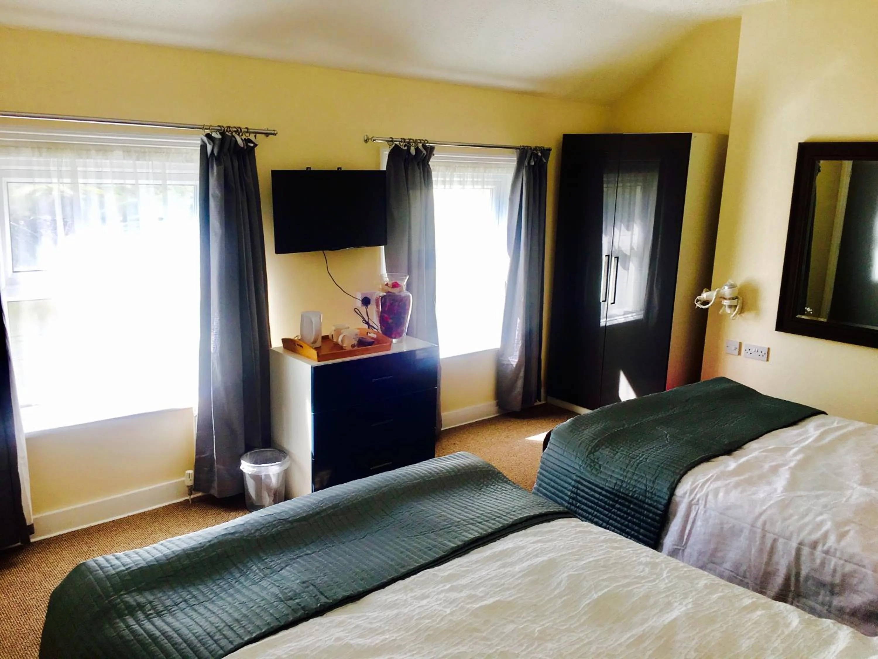 Bed in Villa Mentone Hotel