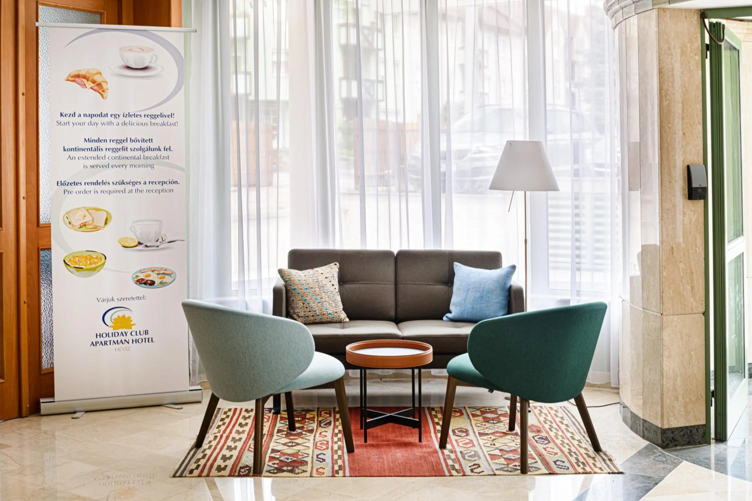 Lobby or reception in Holiday Club Apartman Hotel