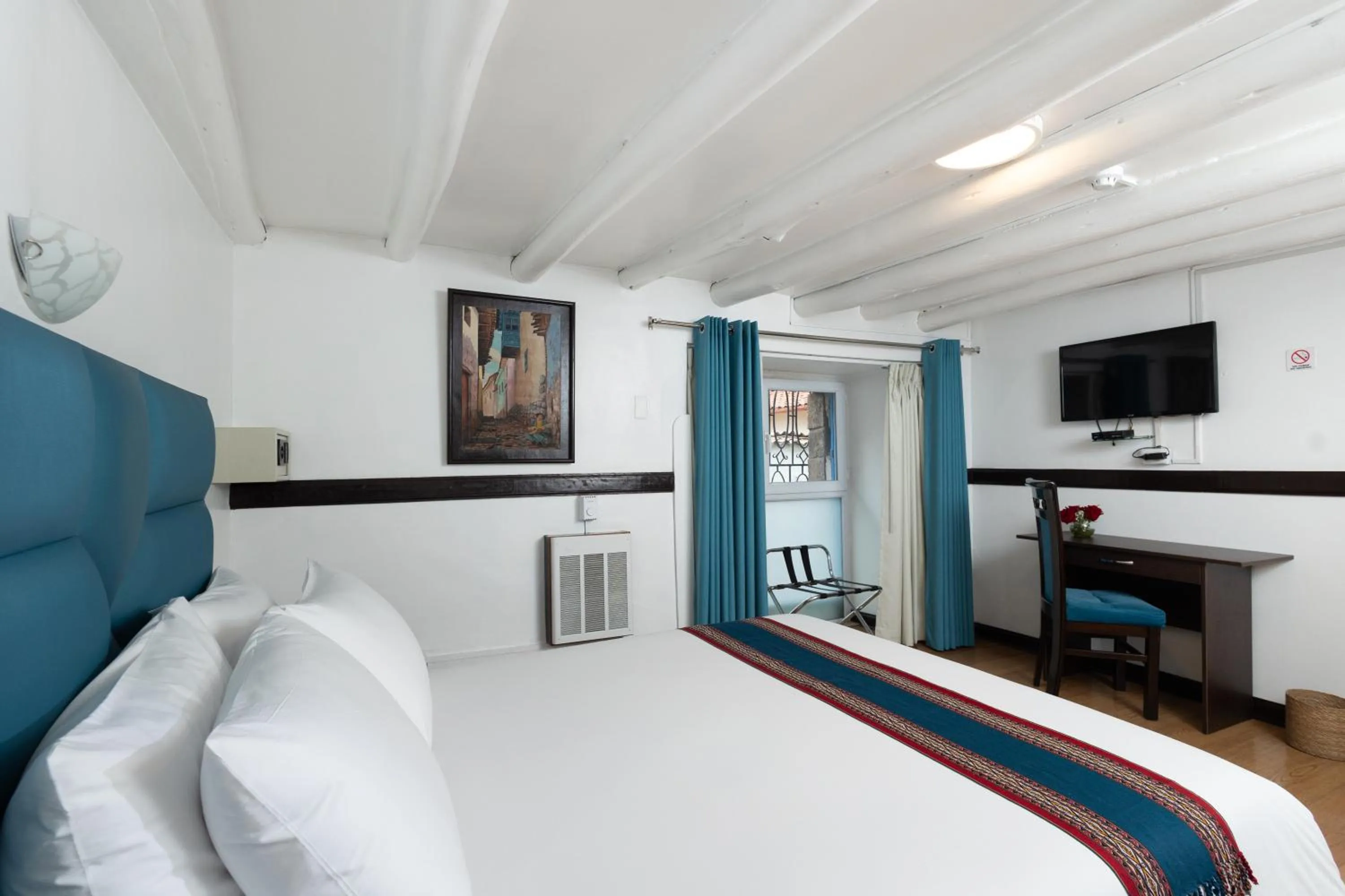 Bed in Hotel Hacienda Cusco Plaza