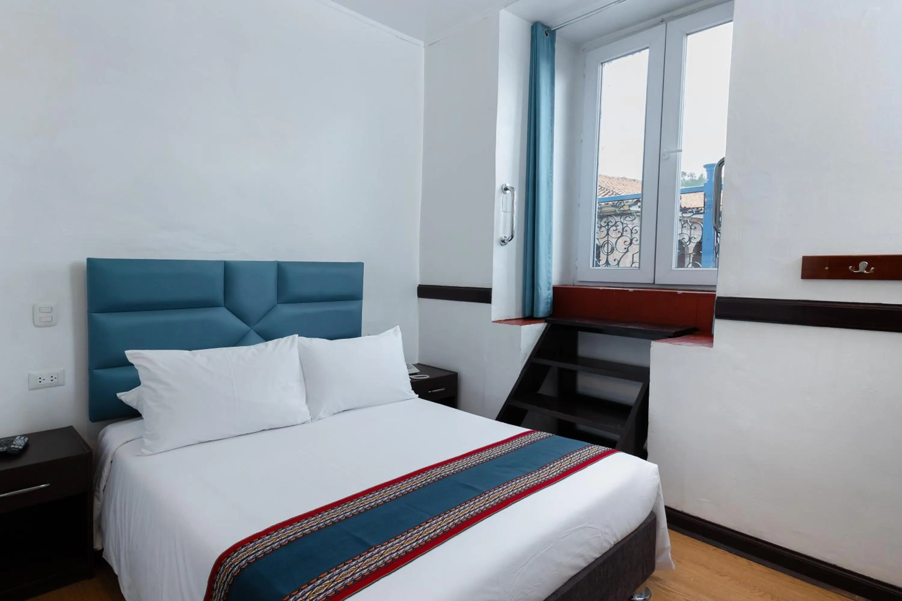 Bed in Hotel Hacienda Cusco Plaza