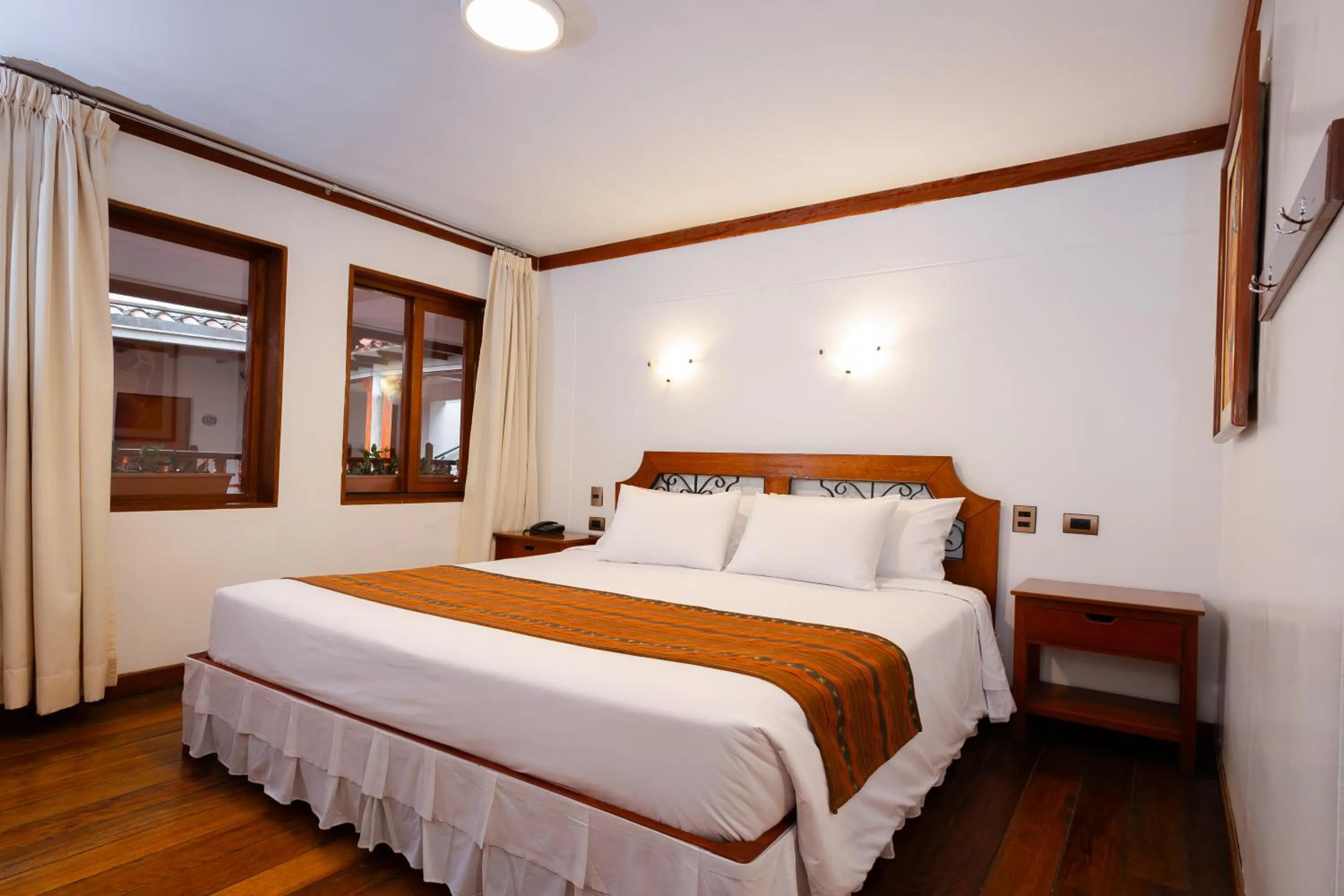 Bed in Hotel Hacienda Cusco Plaza