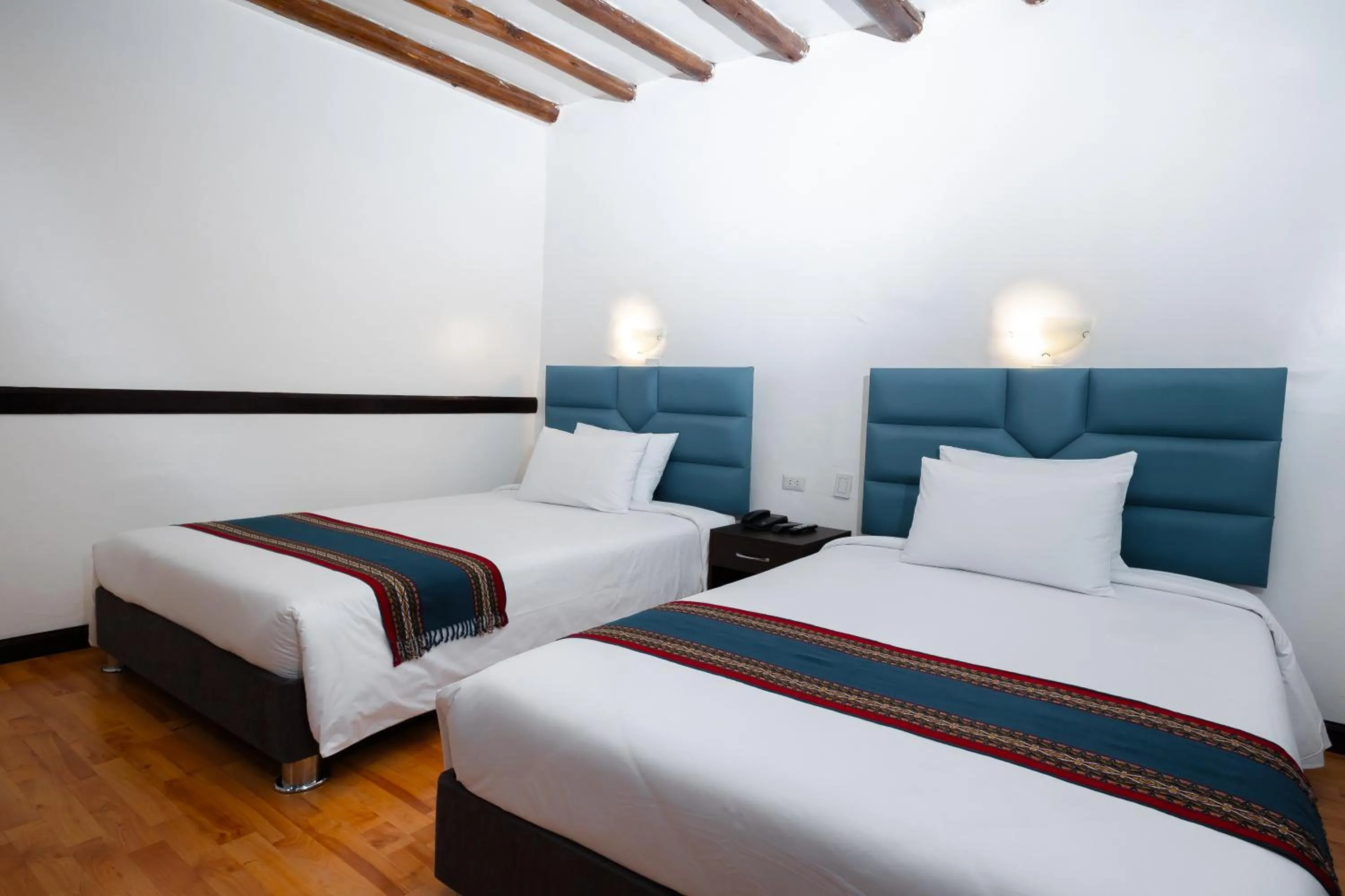 Bed in Hotel Hacienda Cusco Plaza