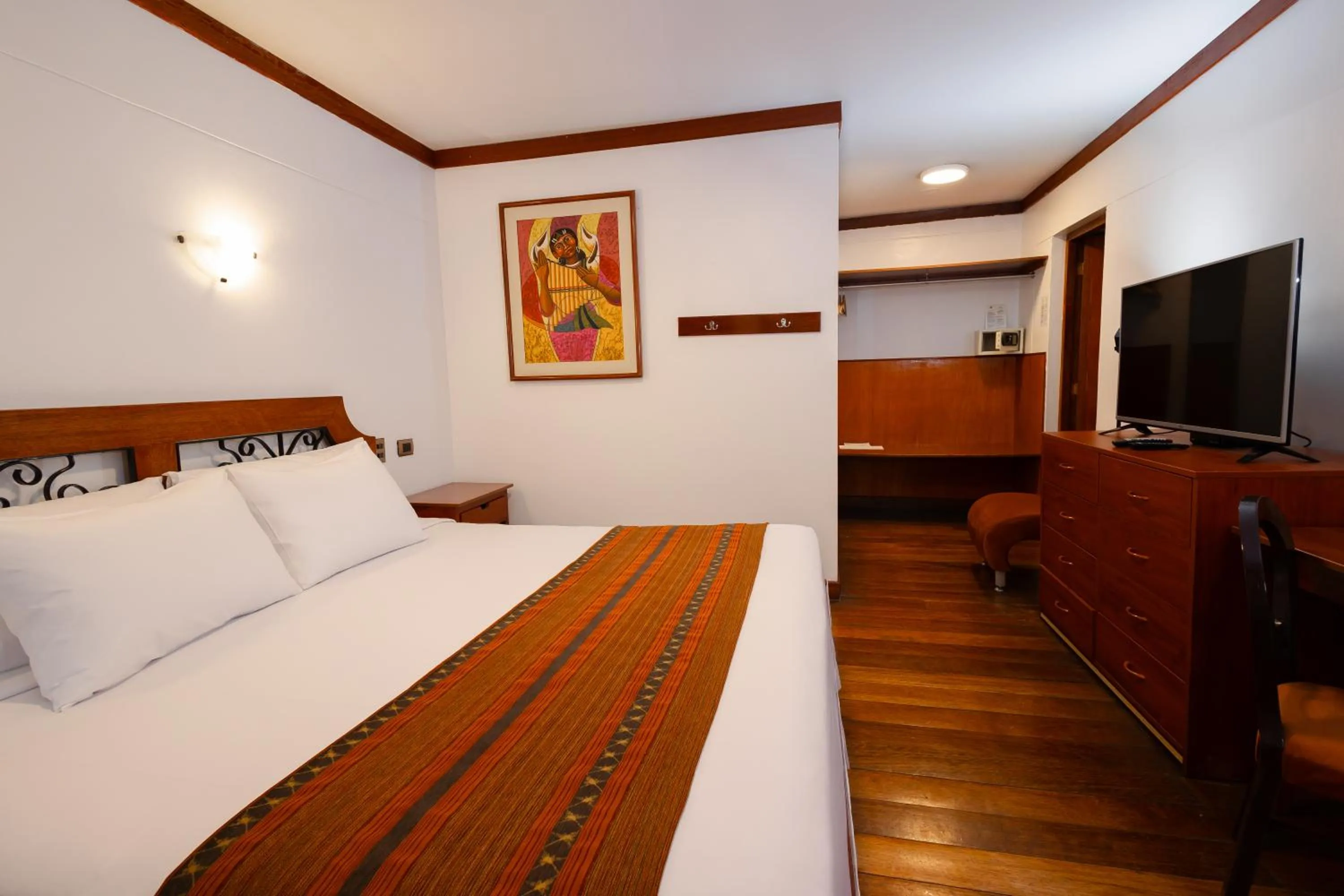 Bed in Hotel Hacienda Cusco Plaza