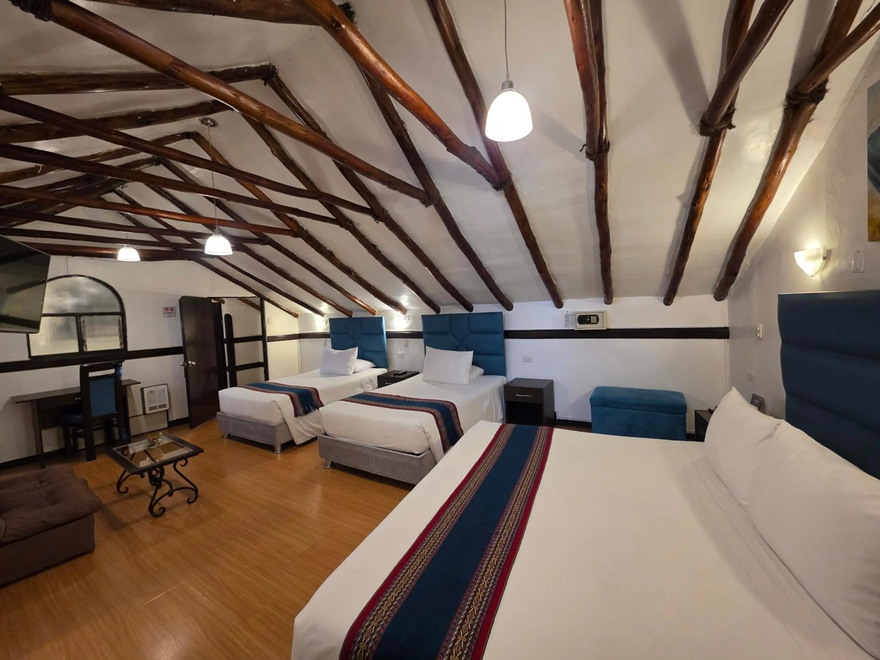 Bed in Hotel Hacienda Cusco Plaza