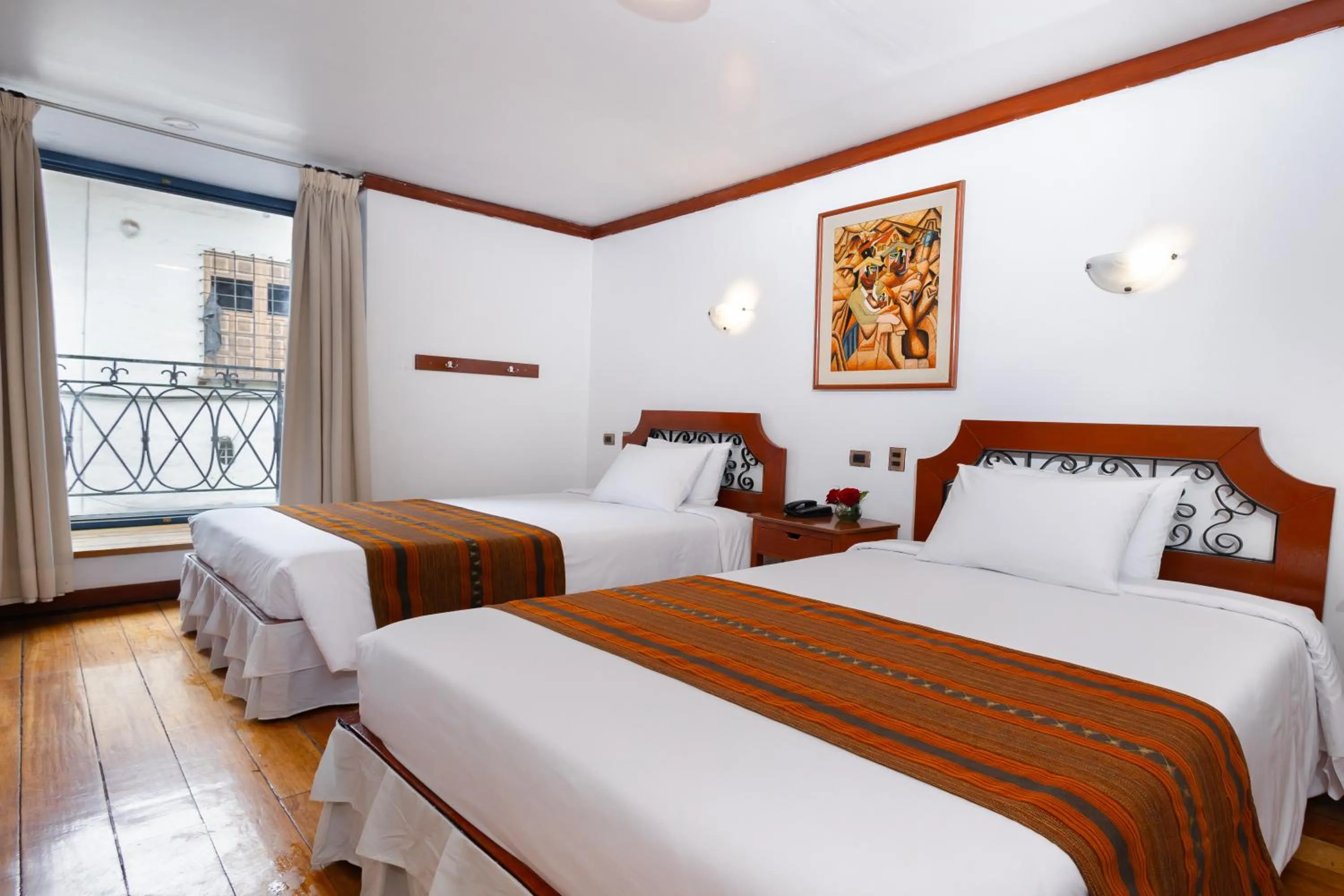 Bed in Hotel Hacienda Cusco Plaza